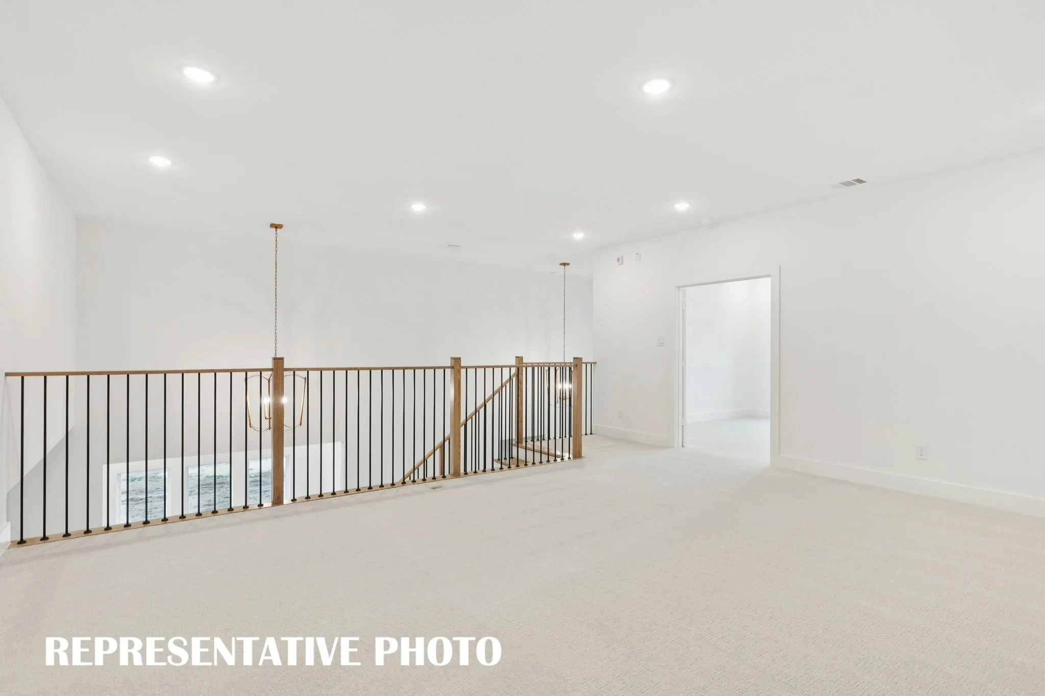 Light, bright and inviting, this wonderful game room offers an outstanding space for family fun time!  REPRESENTATIVE PHOTO