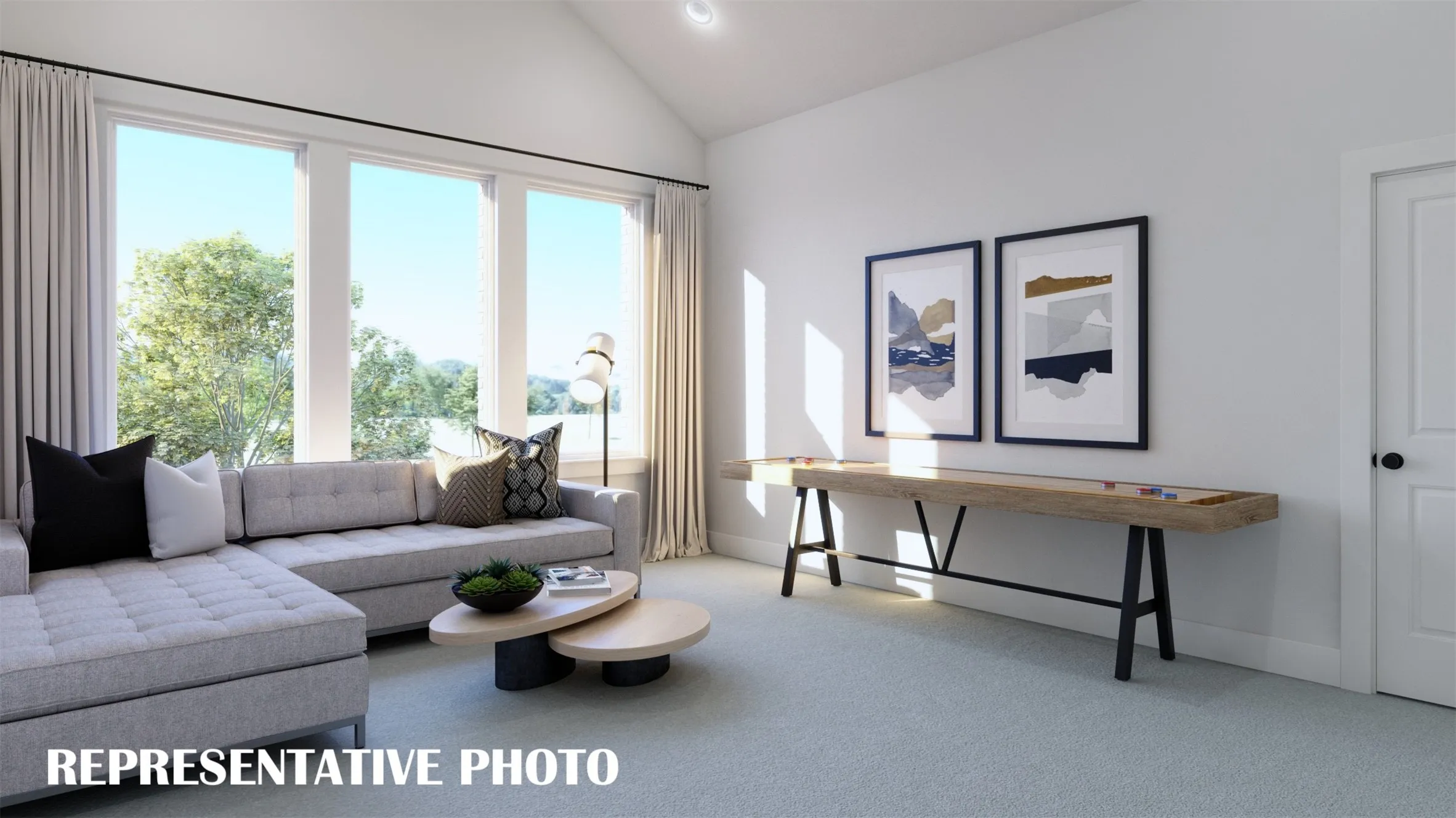 This upstairs light filled game room paired with 2nd media room create the ultimate family entertainment zone.  REPRESENTATIVE PHOTO