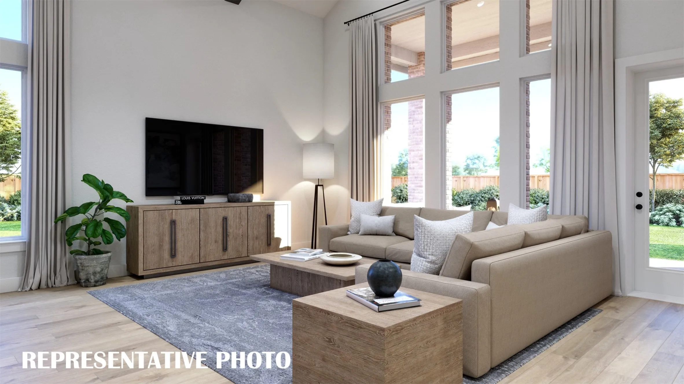 Indoor-outdoor entertaining is a breeze in this wonderful family room featuring a full wall slider that opens to a spacious covered back patio!  REPRESENTATIVE PHOTO