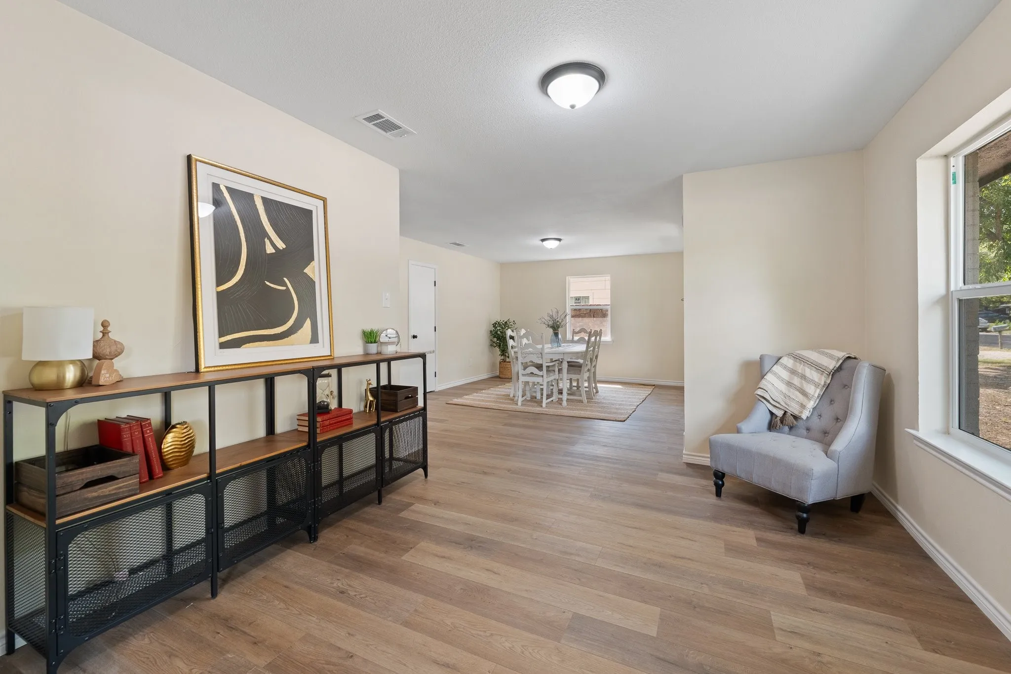 Wood-finish plank flooring throughout