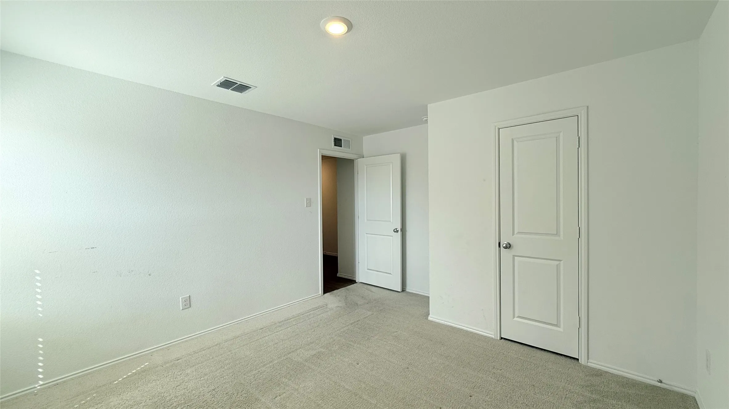 Recessed ceiling light with a white trim