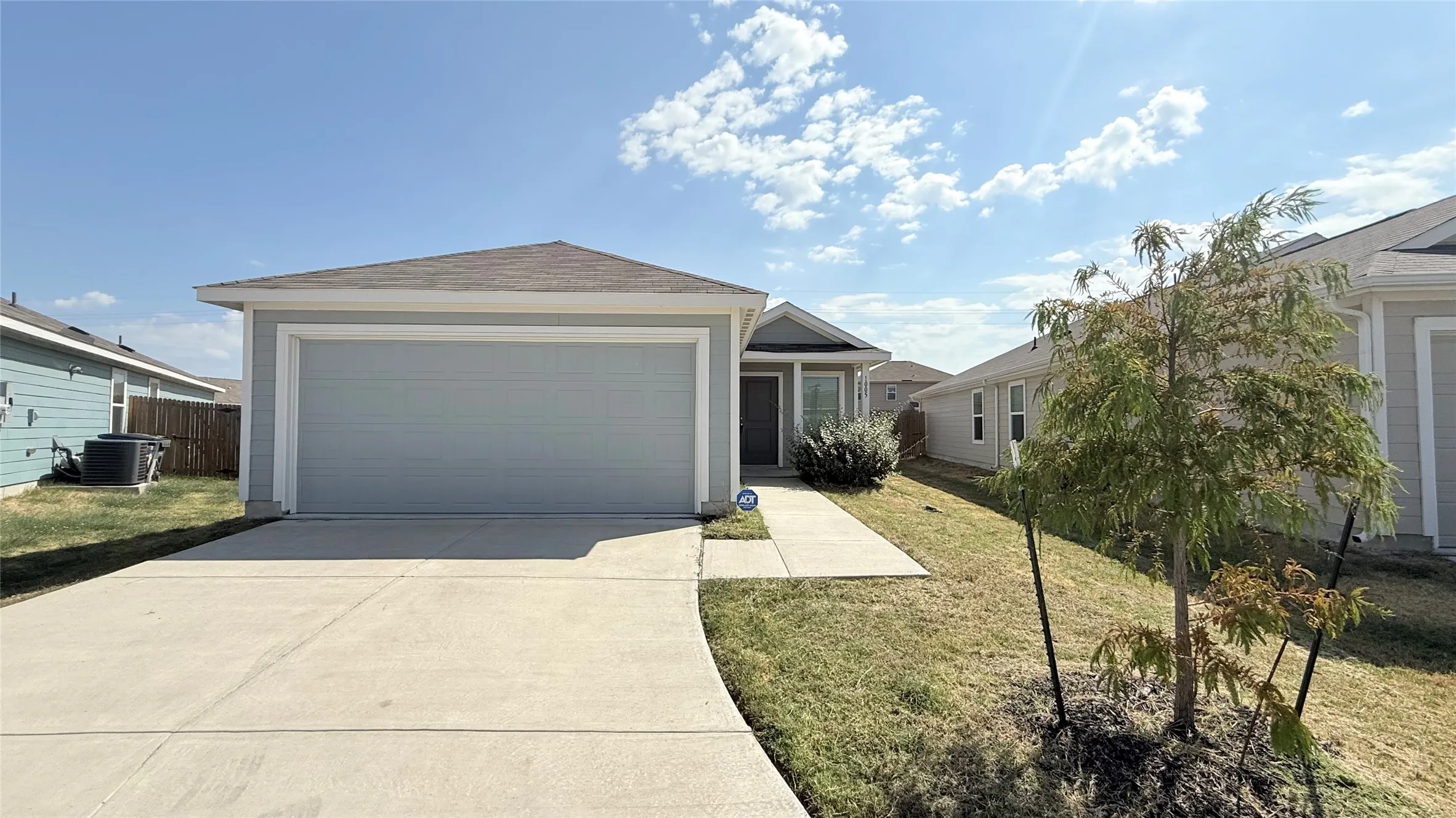 Light gray exterior with a hip roof