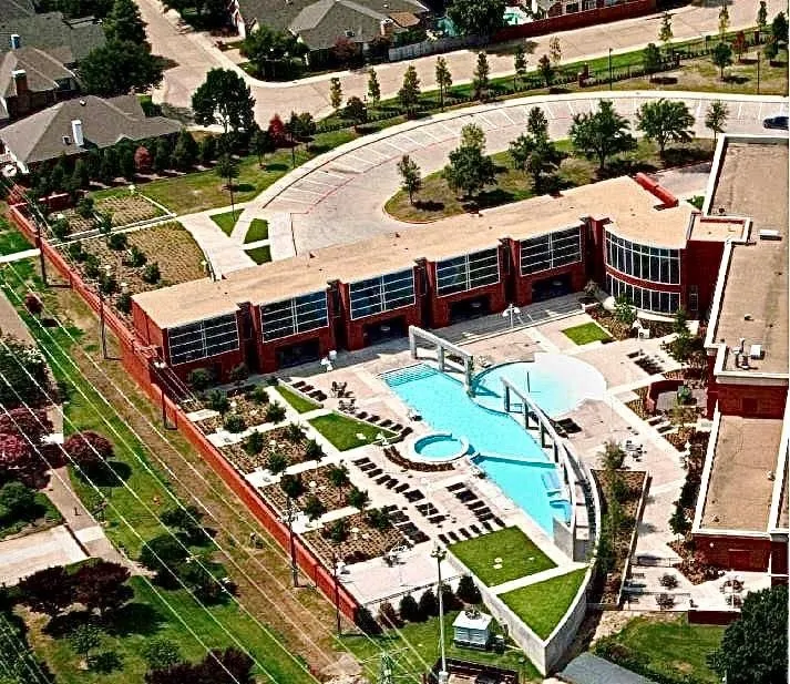 ADDISON ATHLETIC CENTER featuring indoor and outdoor pools.