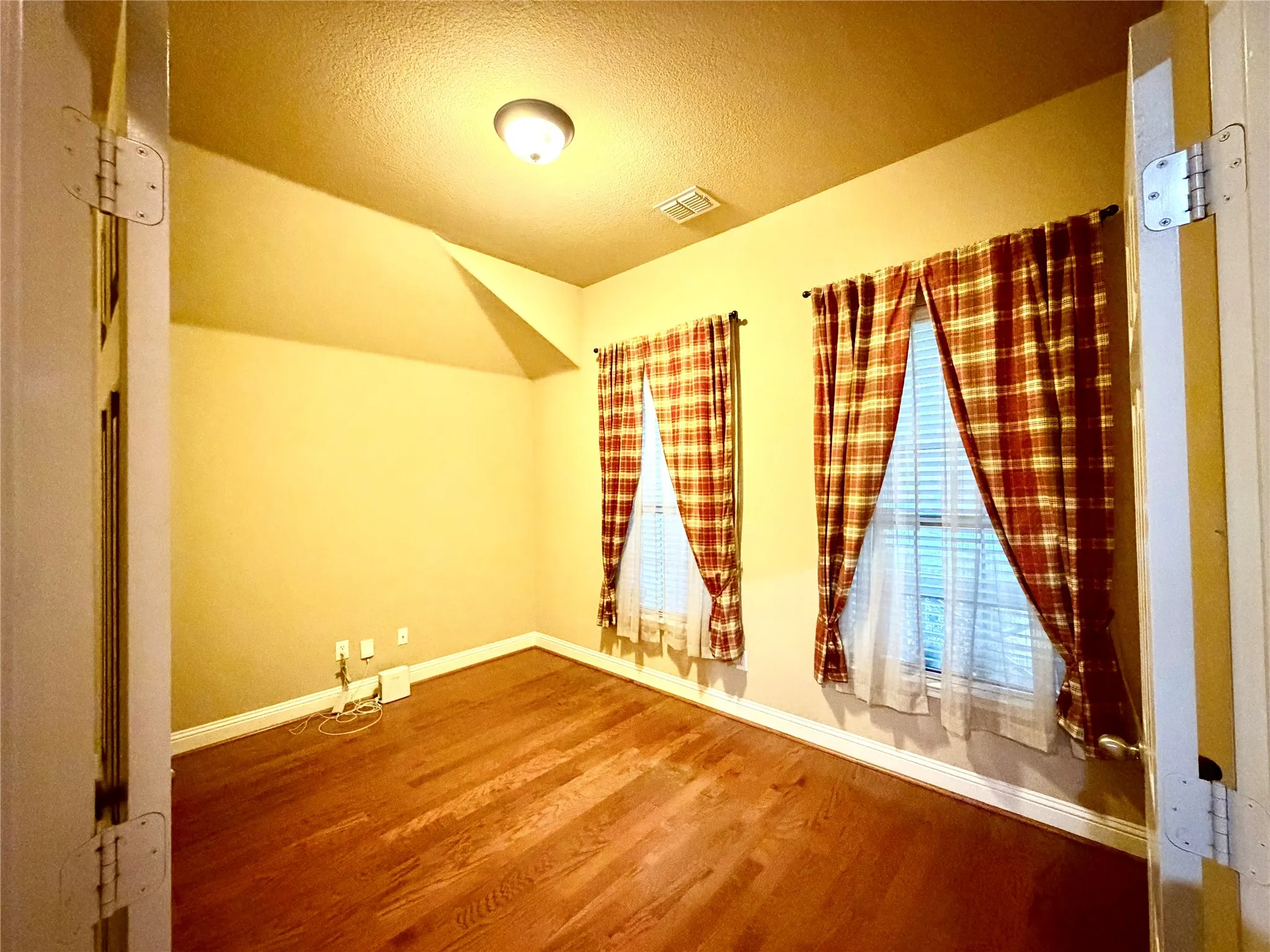 Wood-finish flooring with white trim