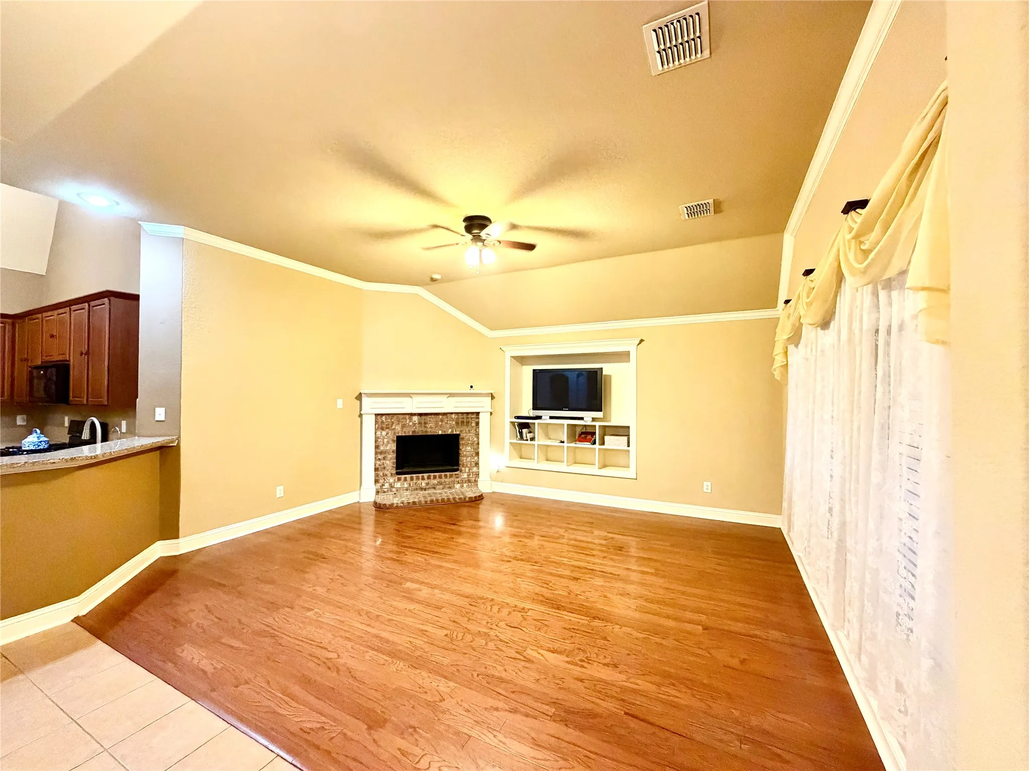 Wood-finish flooring throughout the main living area