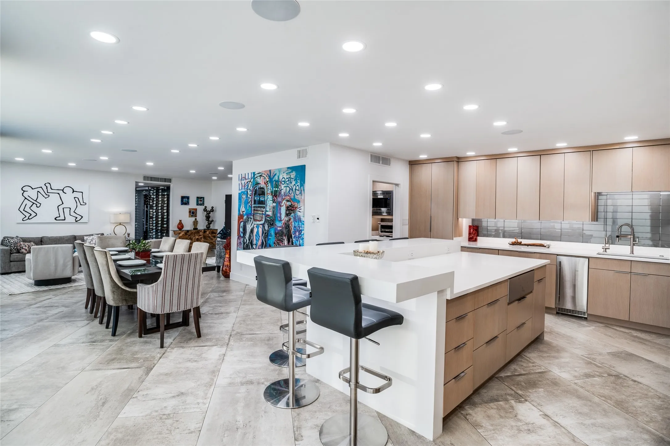 Kitchen facing living-dining areas