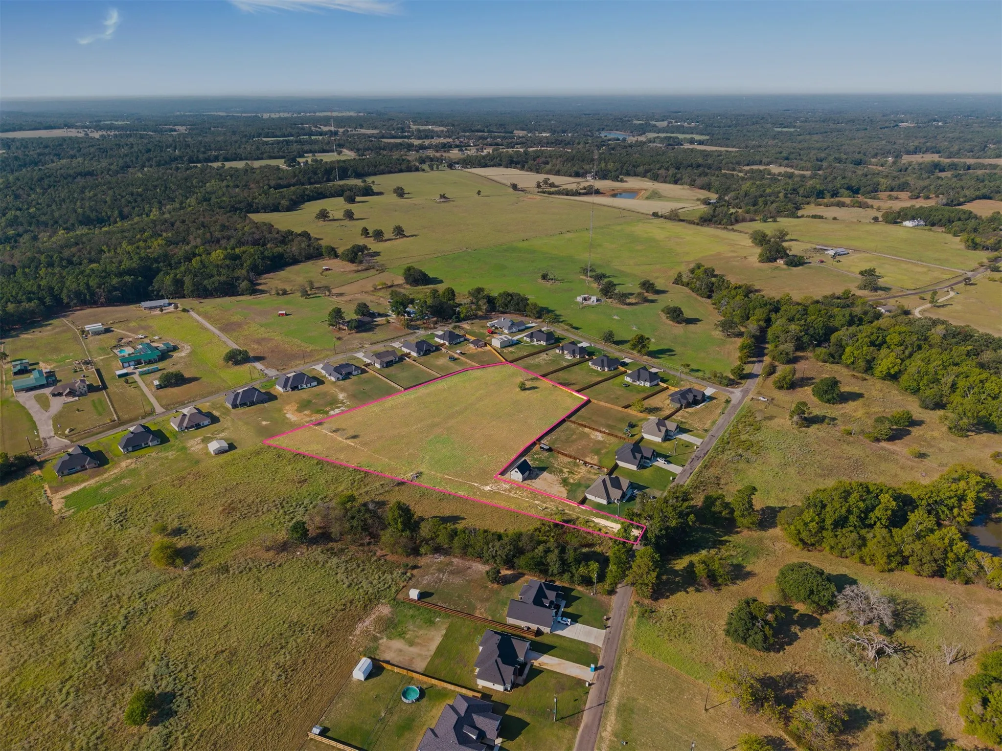 Expansive undeveloped land parcel with marked boundaries
