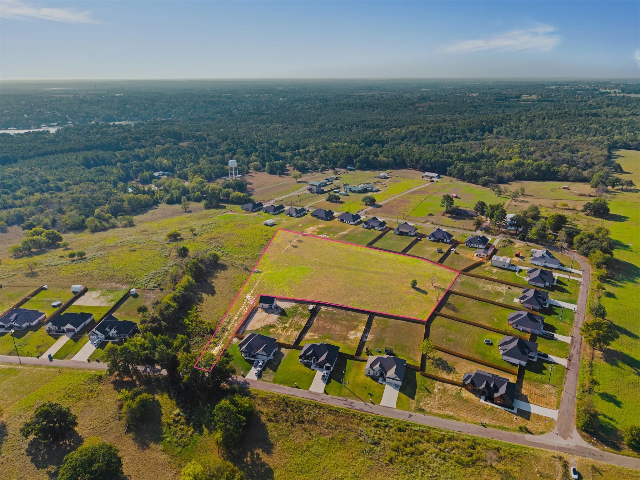 Expansive undeveloped lot featuring clear land and defined boundaries