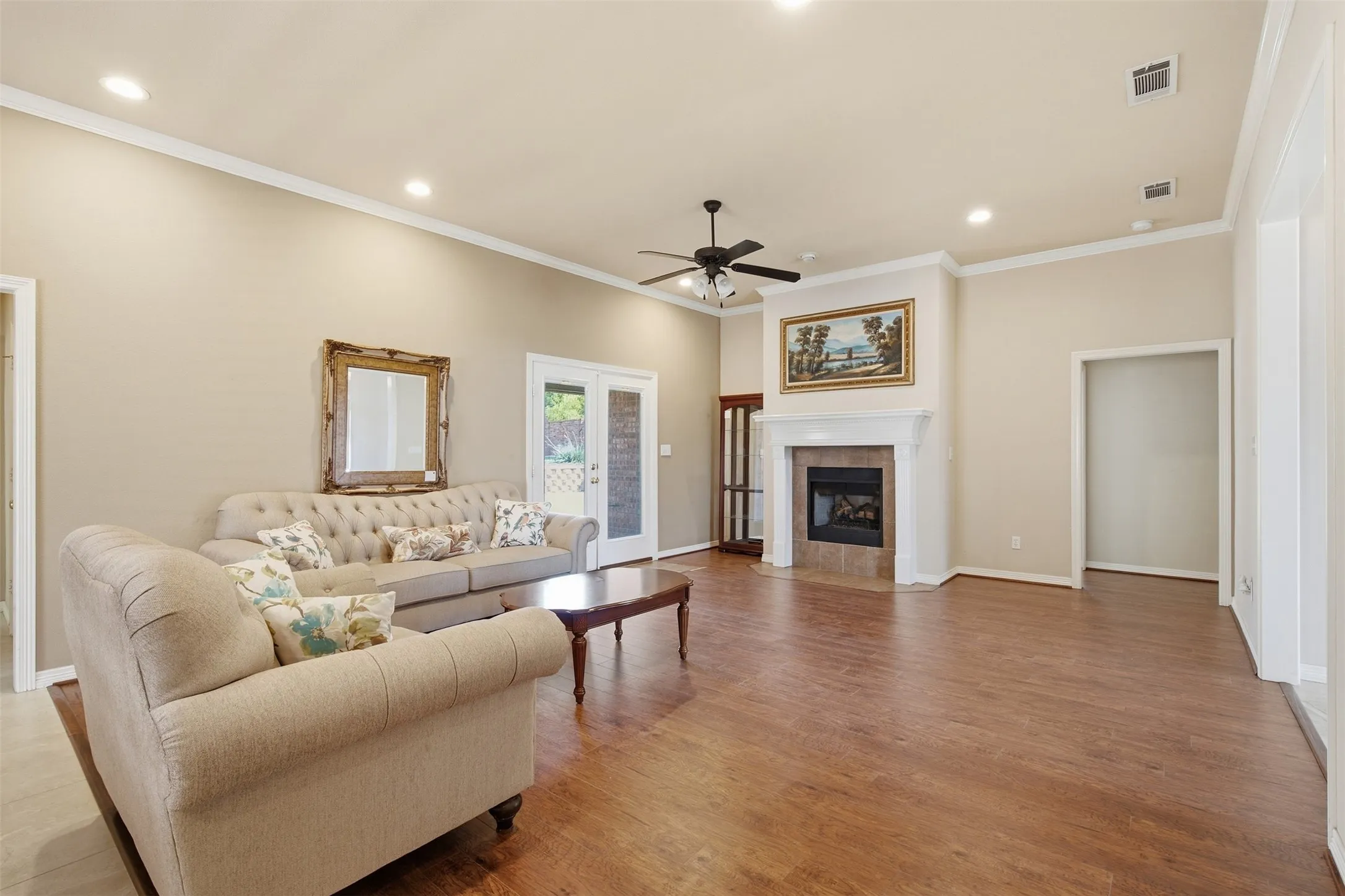 FRENCH DOORS LEAD TO BACK PATIO