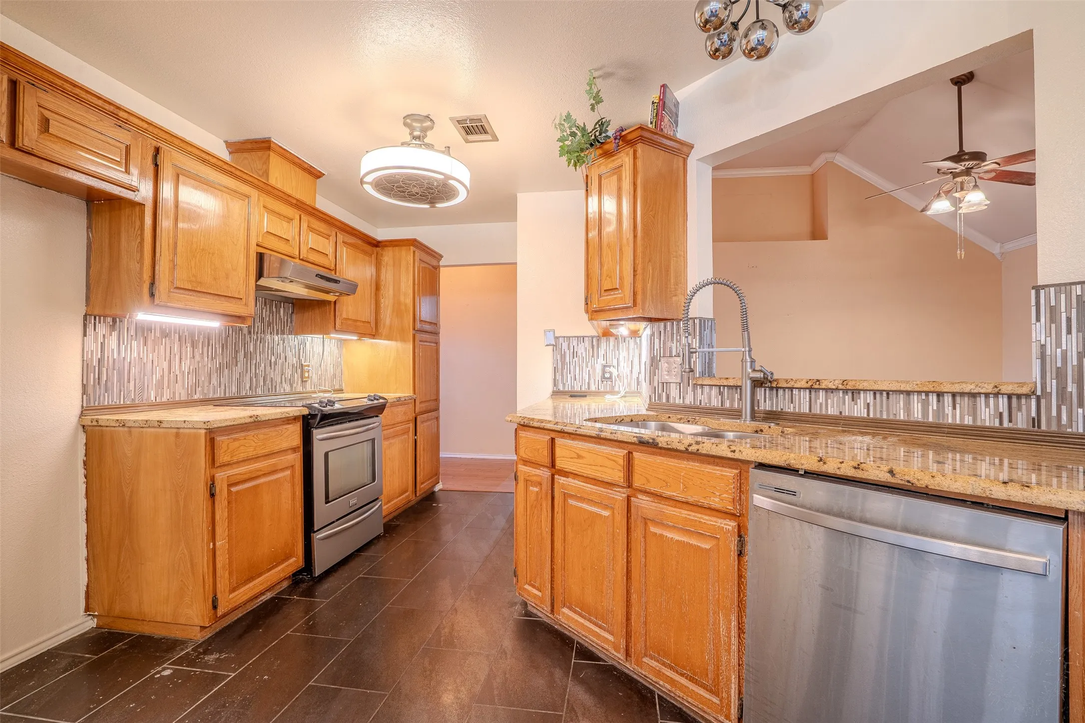 Updated light fixtures, stainless appliances