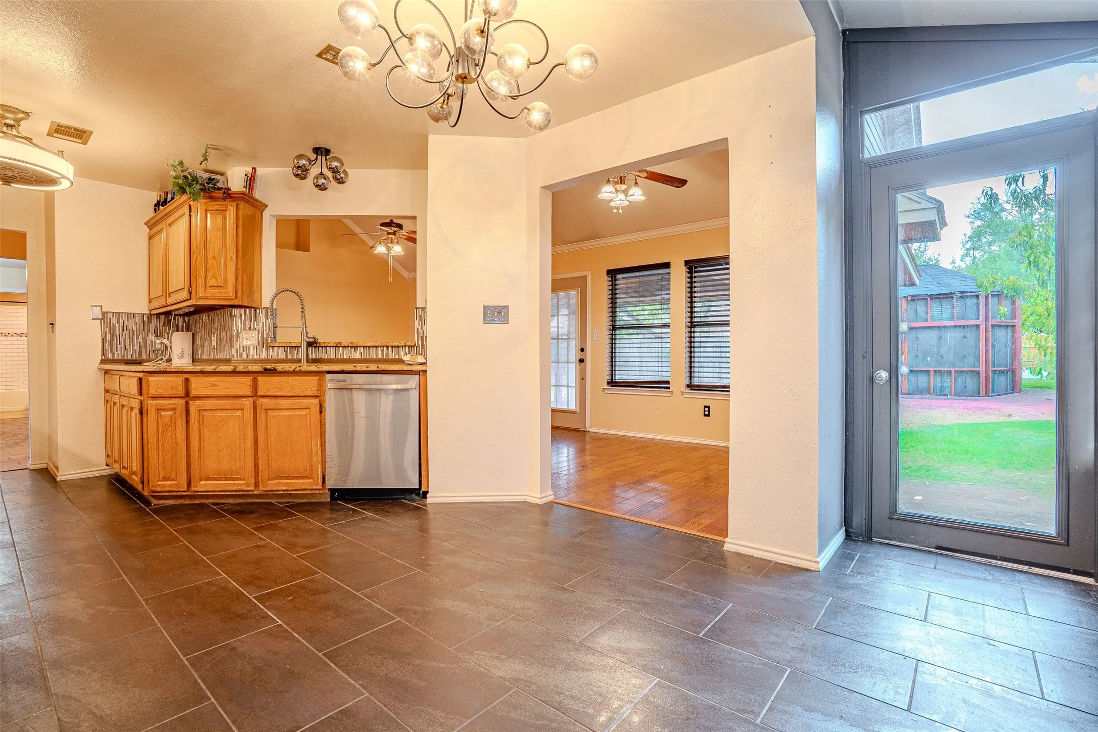 Slate floors, additional door added off breakfast area. Granite countertops