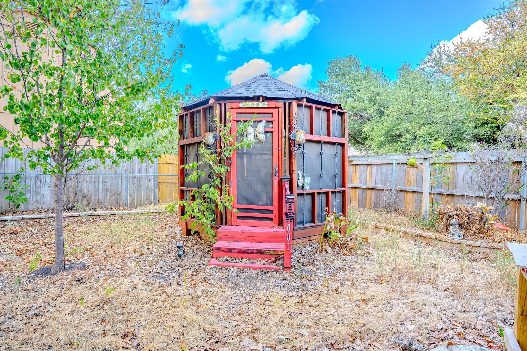 Screened gazebo could be used for poker table or picnic area