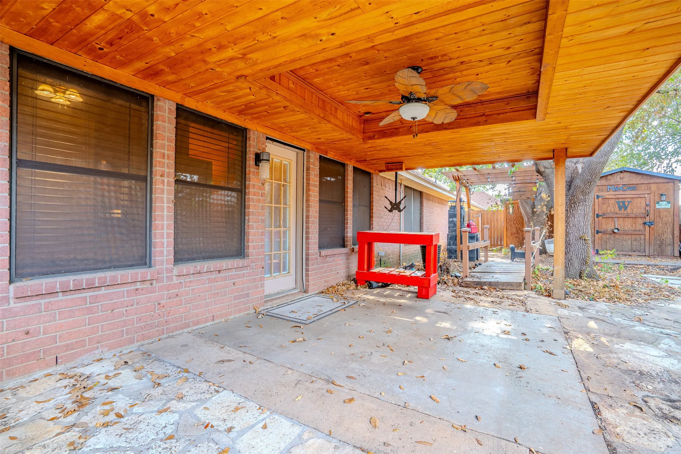 Patio extension with wood ceiling