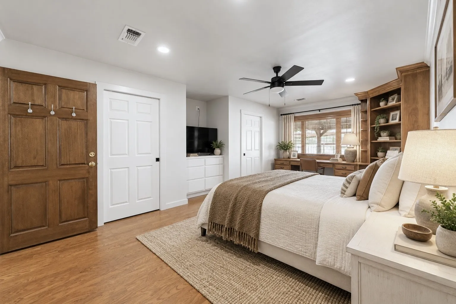 Equipped with DUAL CLOSETS and a modern ceiling fan!!Virtually Staged.