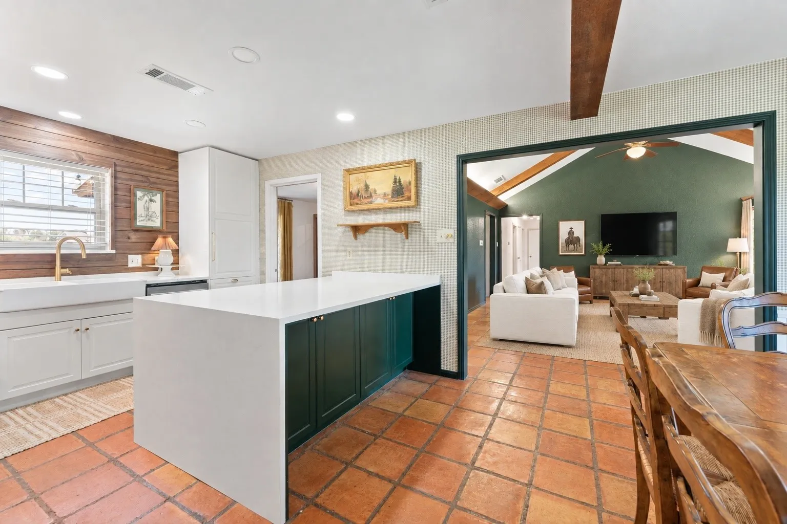 The kitchen is the perfect balance of modern upgrades while still keeping the rustic, farmhouse look!! Check out the under island storage! Waterfall countertops!!