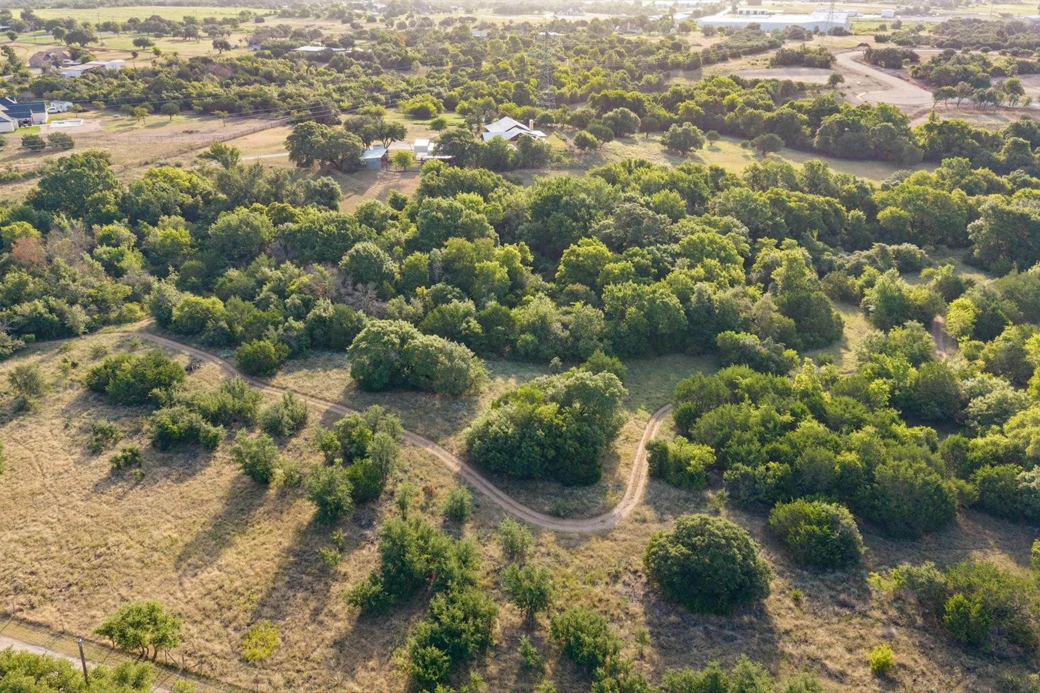 This property has its own PRIVATE TRAILS!! Perfect for the horses, walking/running, or riding a golf cart/side by side. This allows you to truly soak in the outdoors, one of the many perks of this private homestead! You'll never have to leave.
