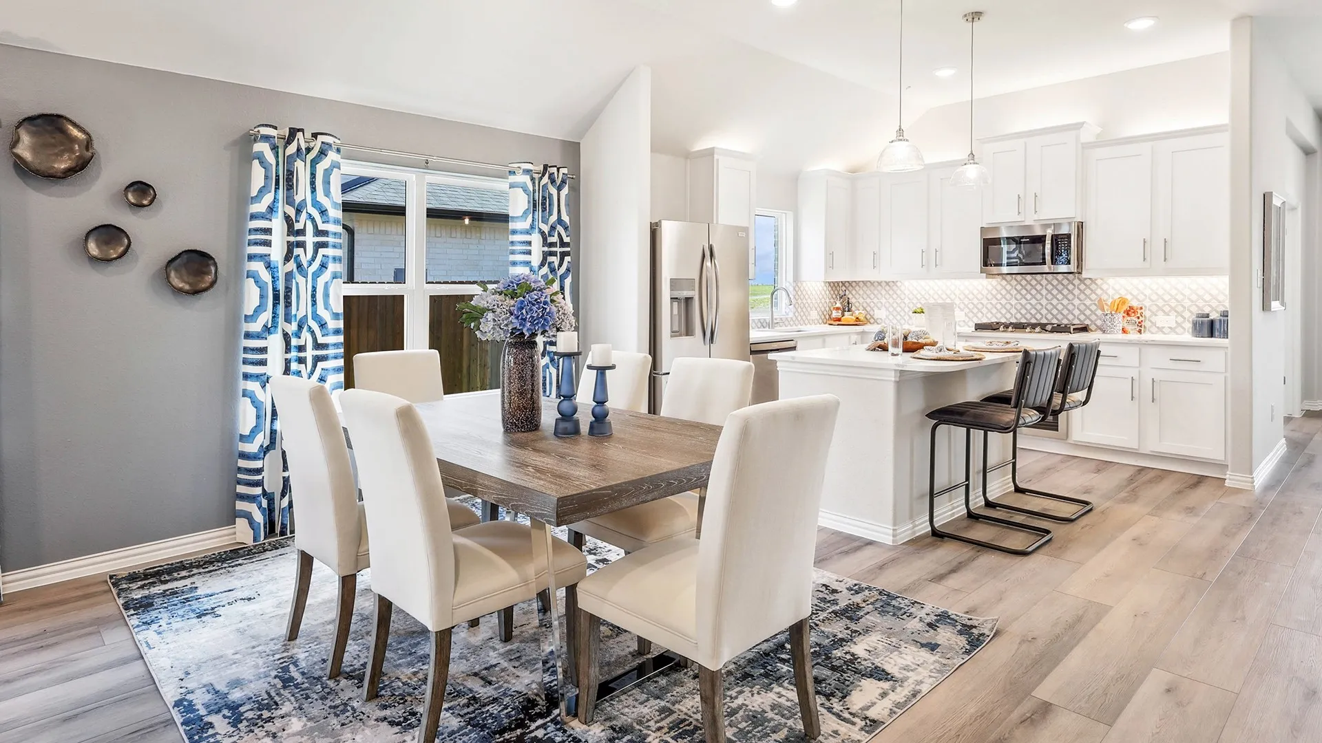 Model home photos of similar floorplans, not pictures of actual home.
