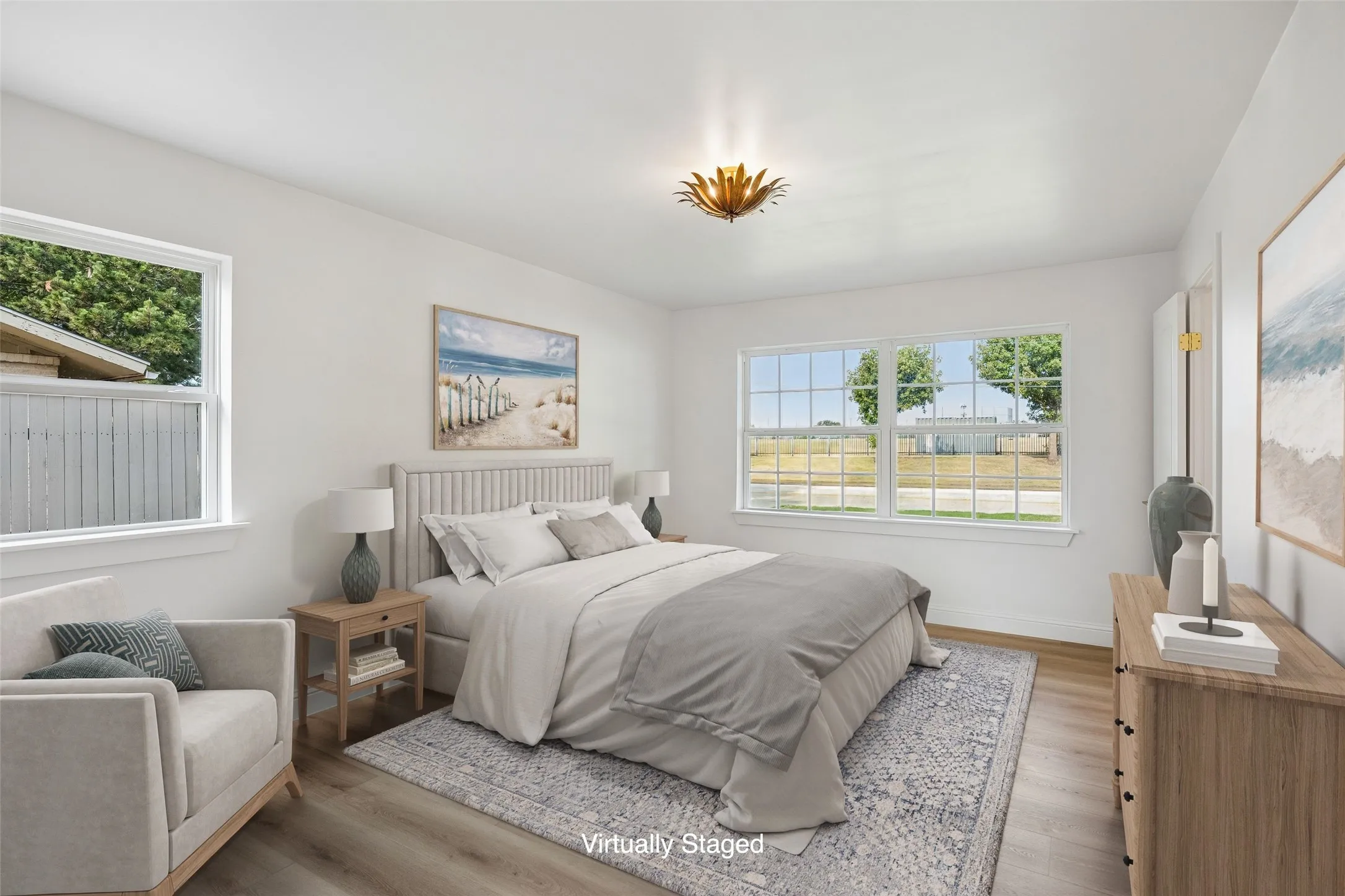 Guest ready and thoughtfully connected. This bedroom shares a Jack and Jill bath with the room next door, LVT floors throughout, and a walk in closet.