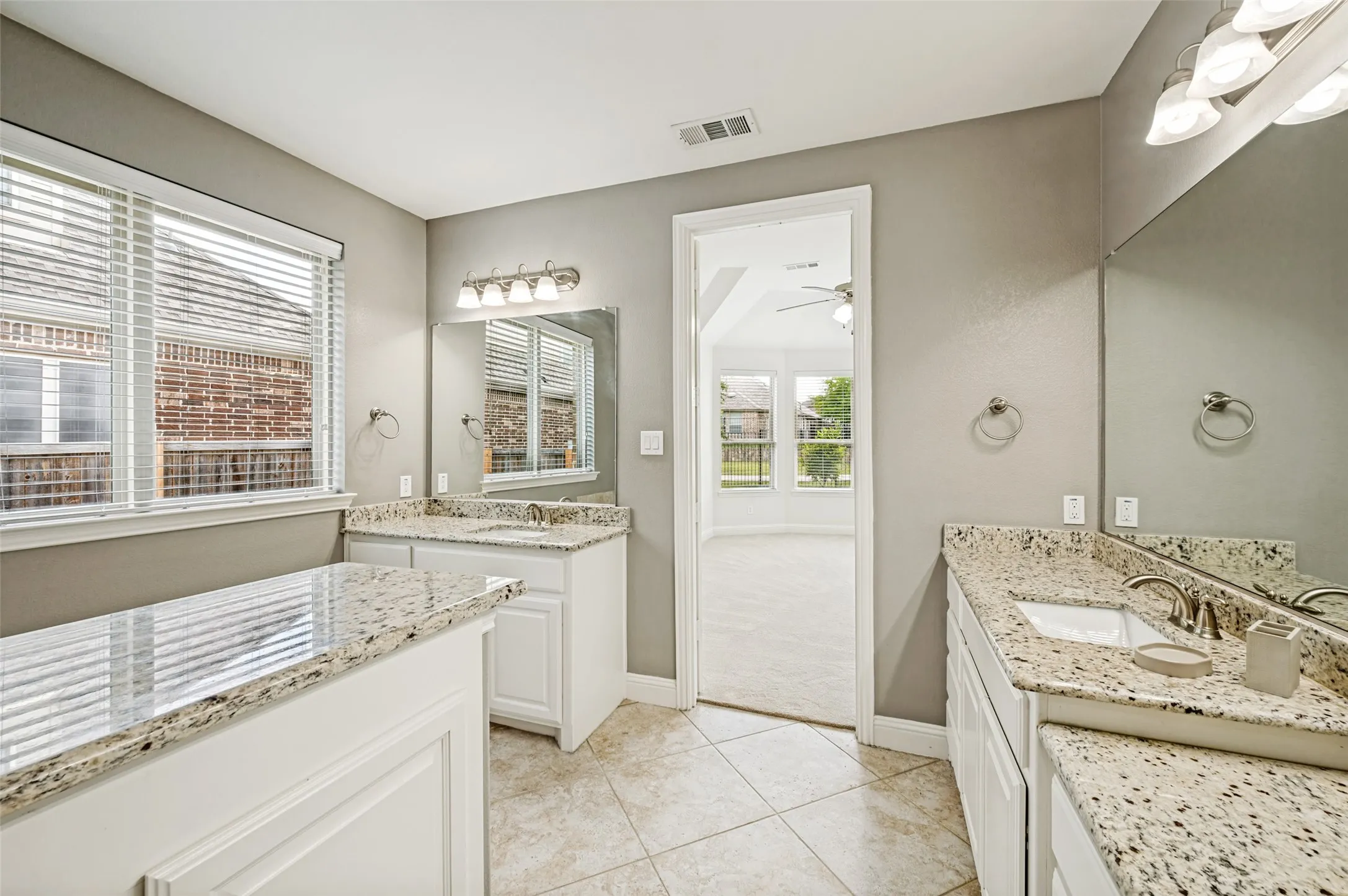 Primary bath with dual vanities
