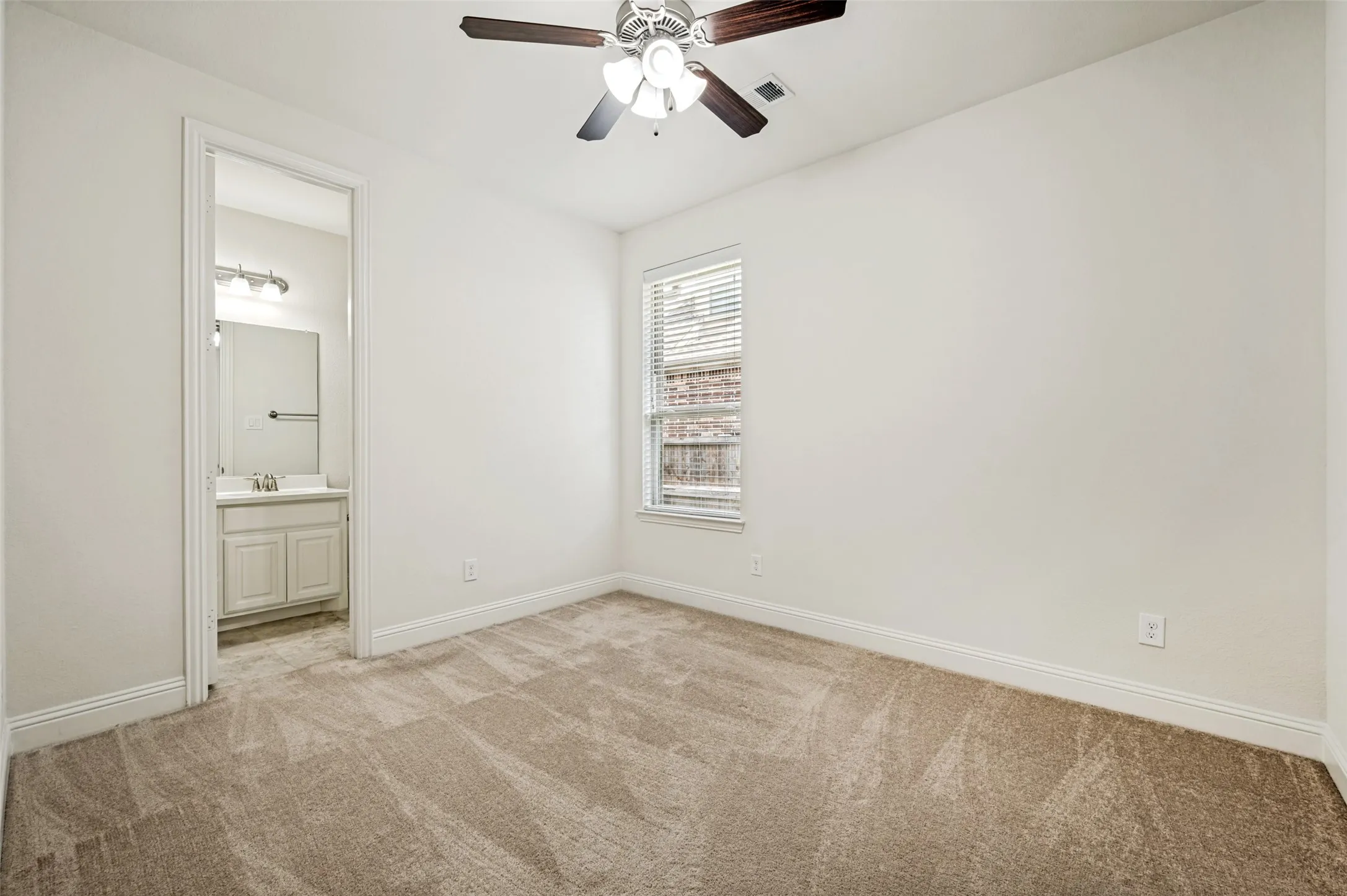 Private split bedroom with ensuite bath with showered tub