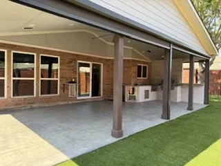 Motorized shutters and outdoor kitchen