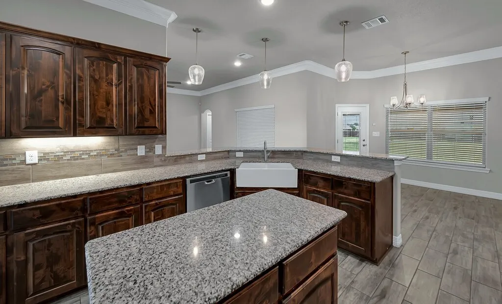 Wood-finish cabinetry paired with light-toned countertops