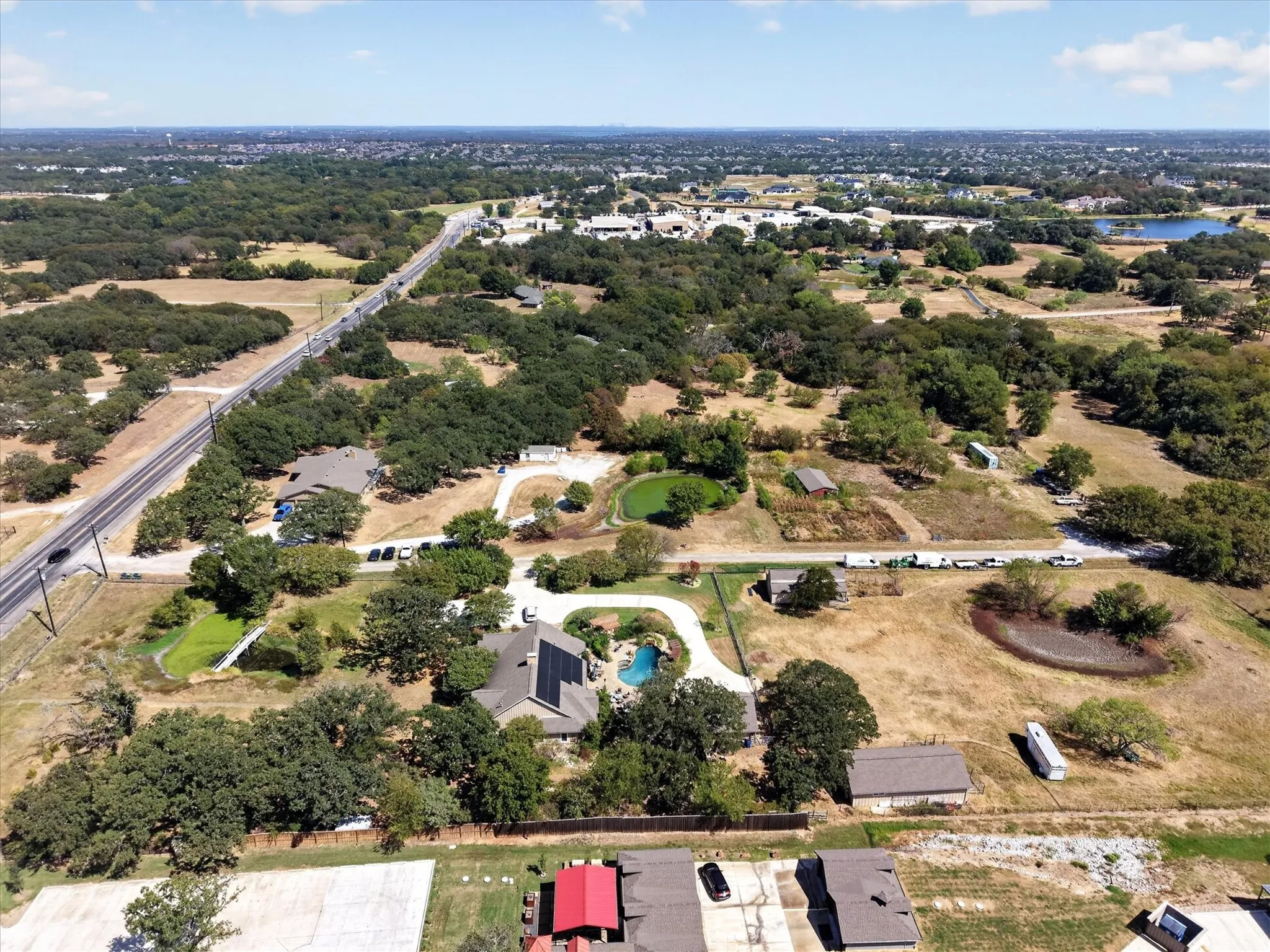 Elevated aerial view of the property and surrounding area.