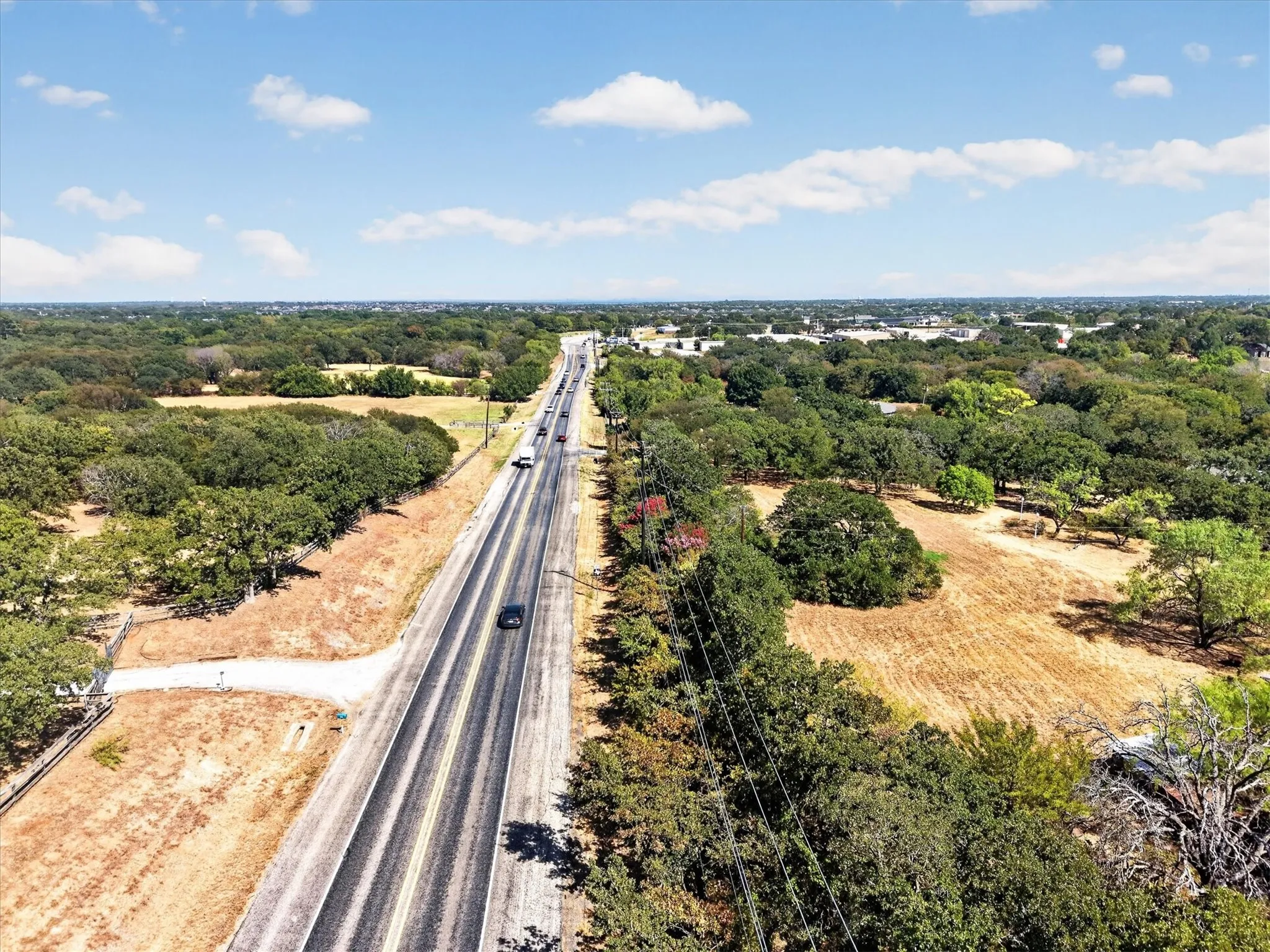 View along FM 407 highlighting the property's location and convenient roadway access.