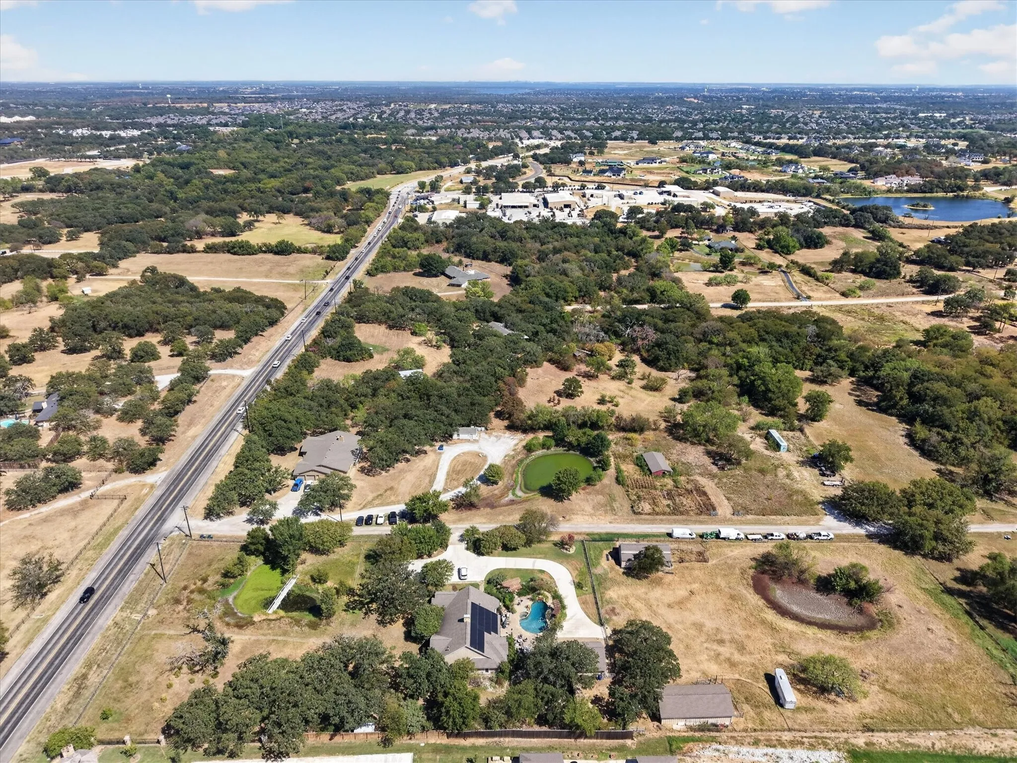 Elevated aerial perspective of the property and surrounding area.