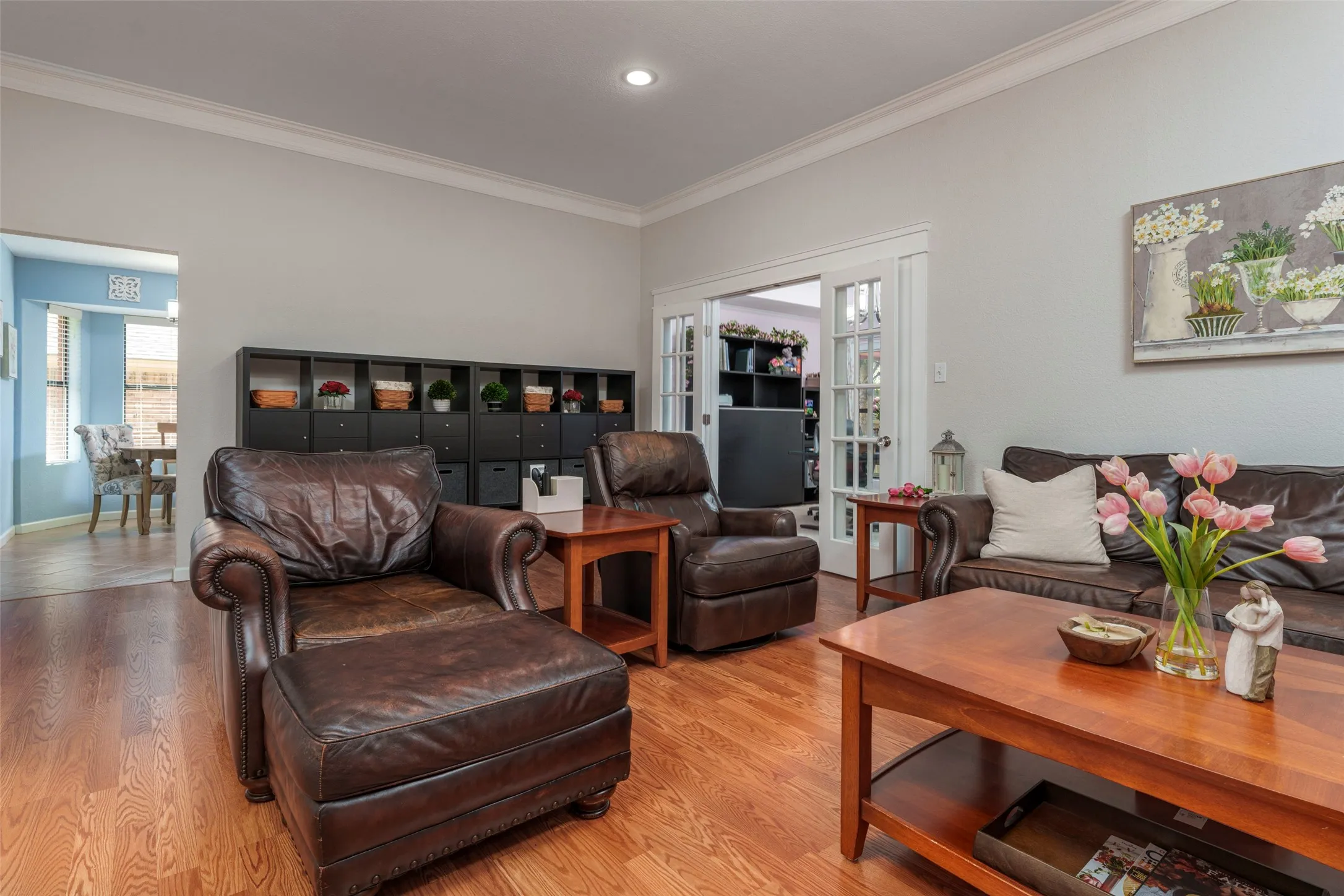 Full Glass Storm Doors & wood style flooring throughout