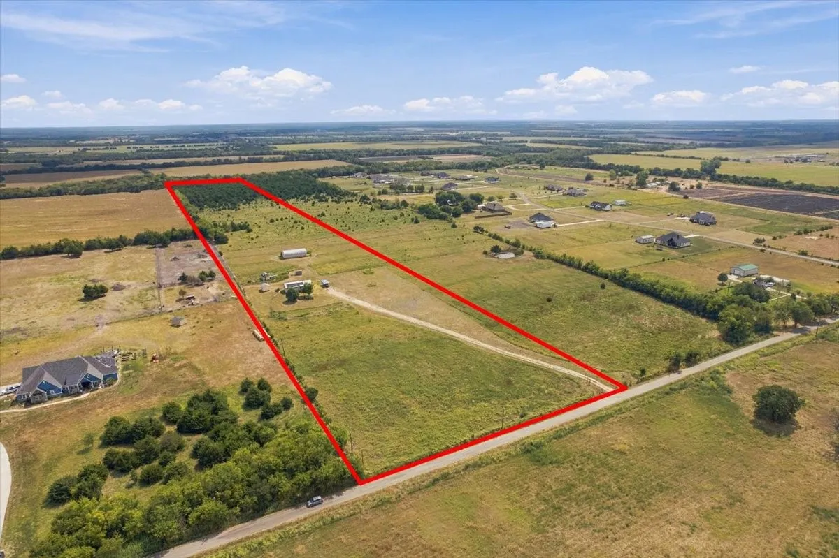 Aerial view of property  Red boundary line is approximate