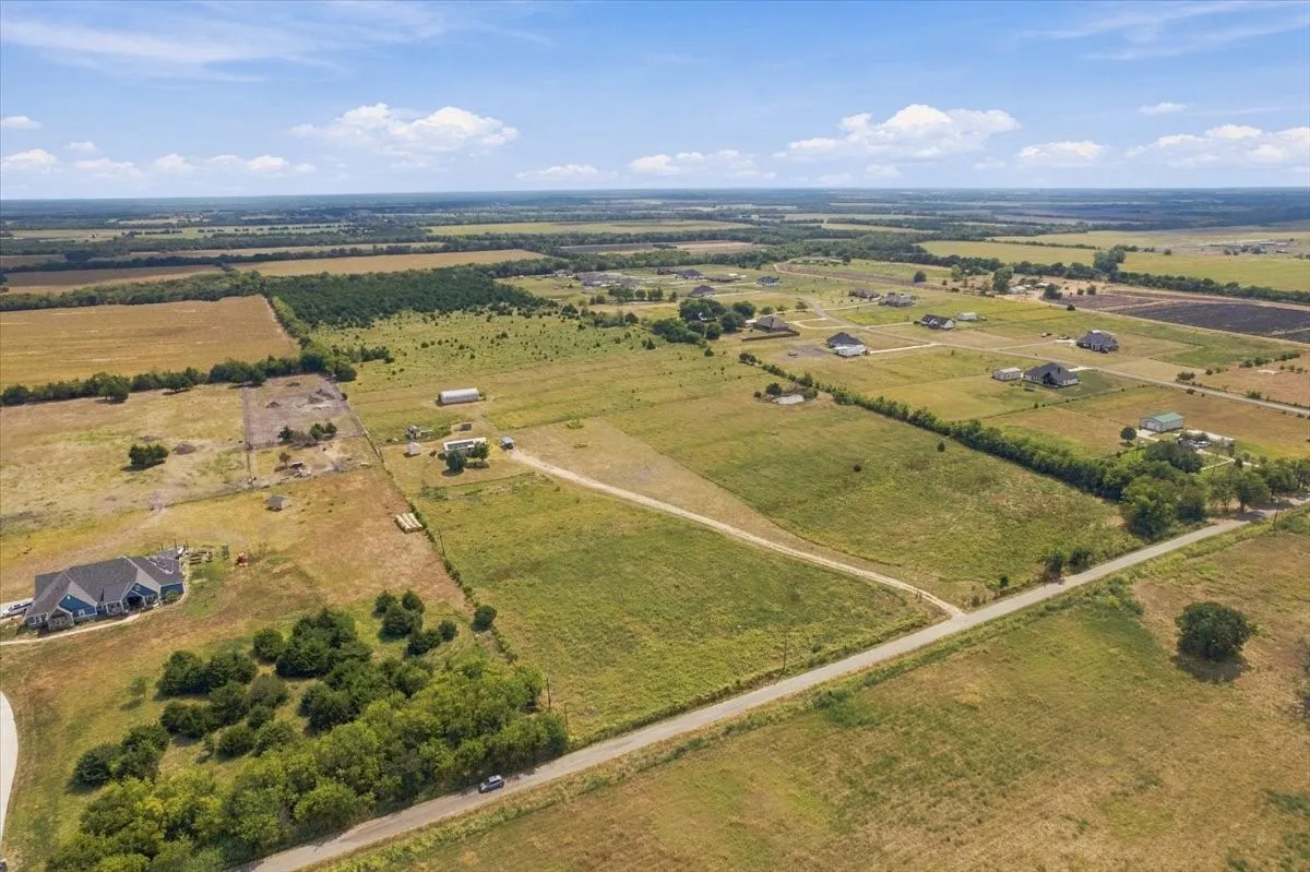 Aerial view with surrounding properties
