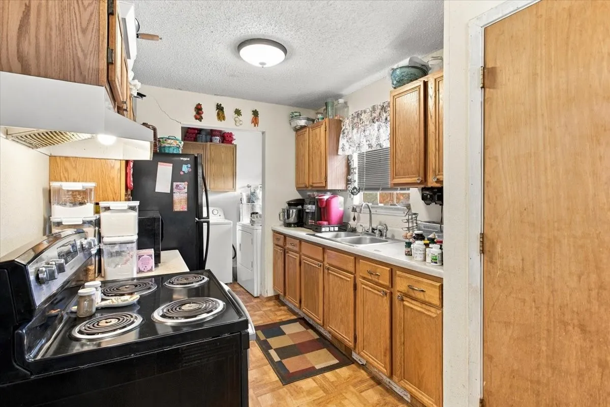 Kitchen looking into utility room