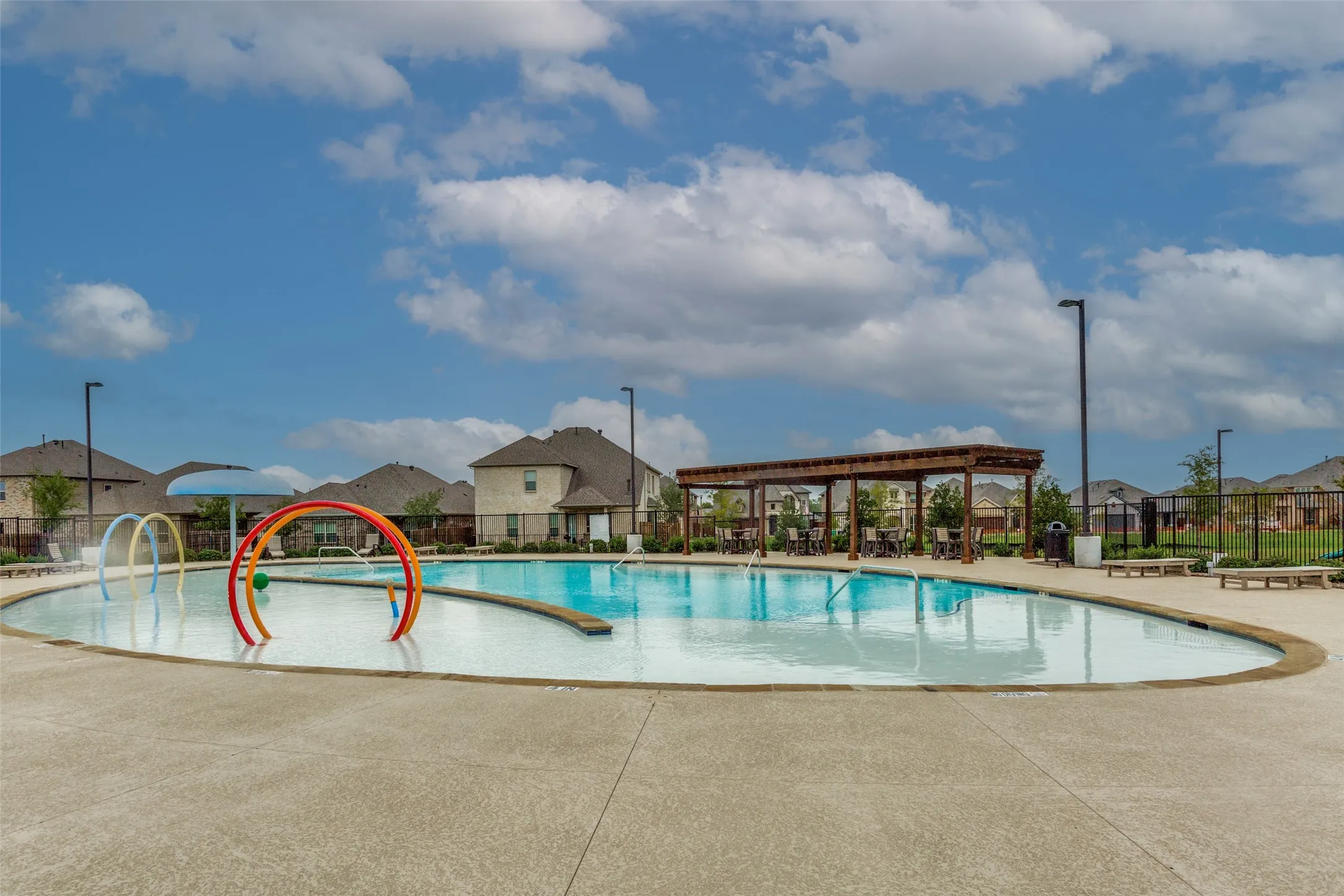 View of North pool with a splash pad