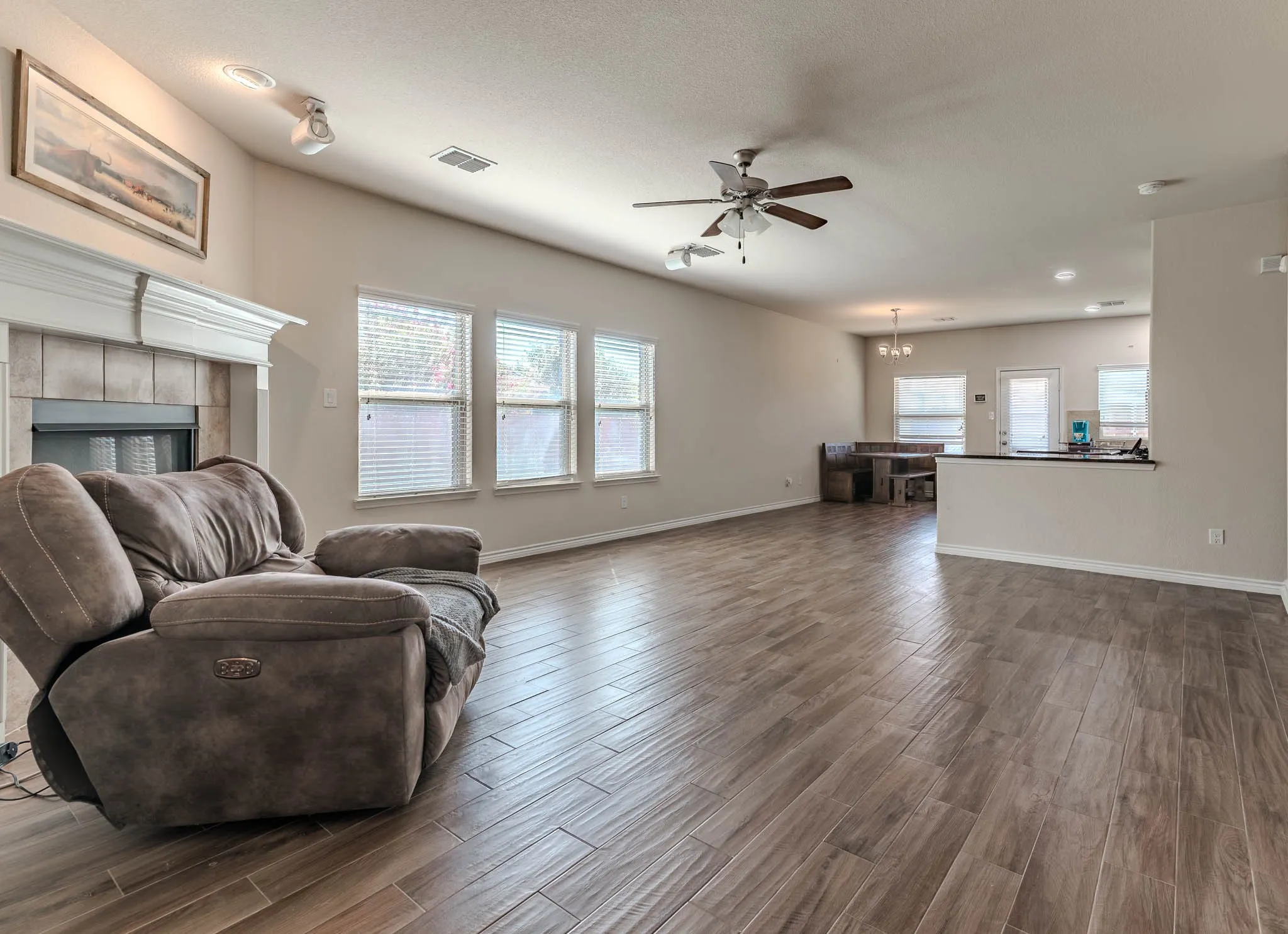 Open concept living room with wood-type flooring