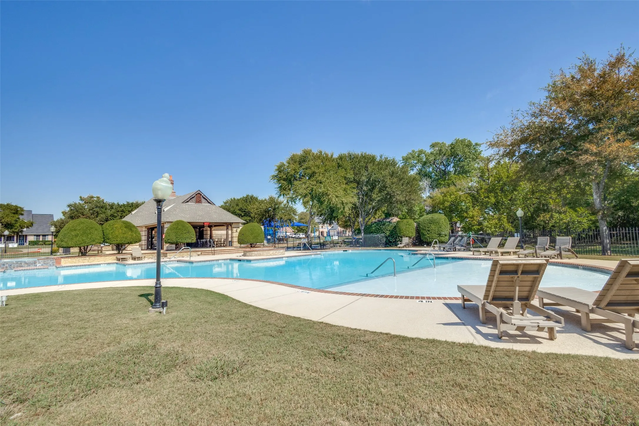 View of South swimming pool featuring a gazebo, a lawn, and a patio