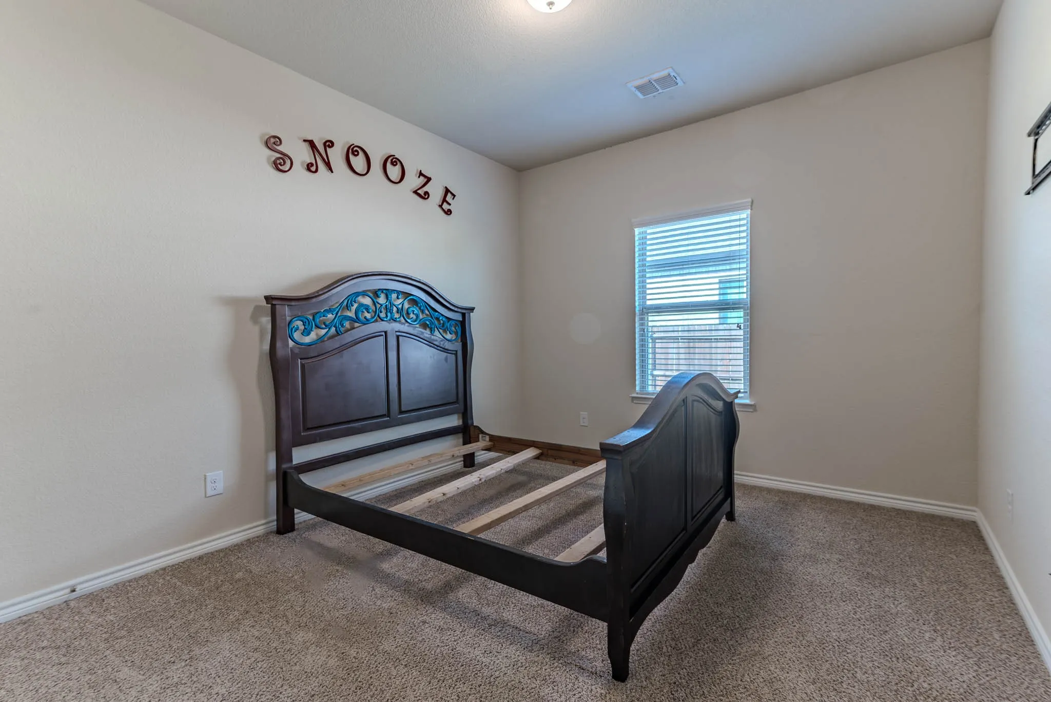 Bedroom two with carpet