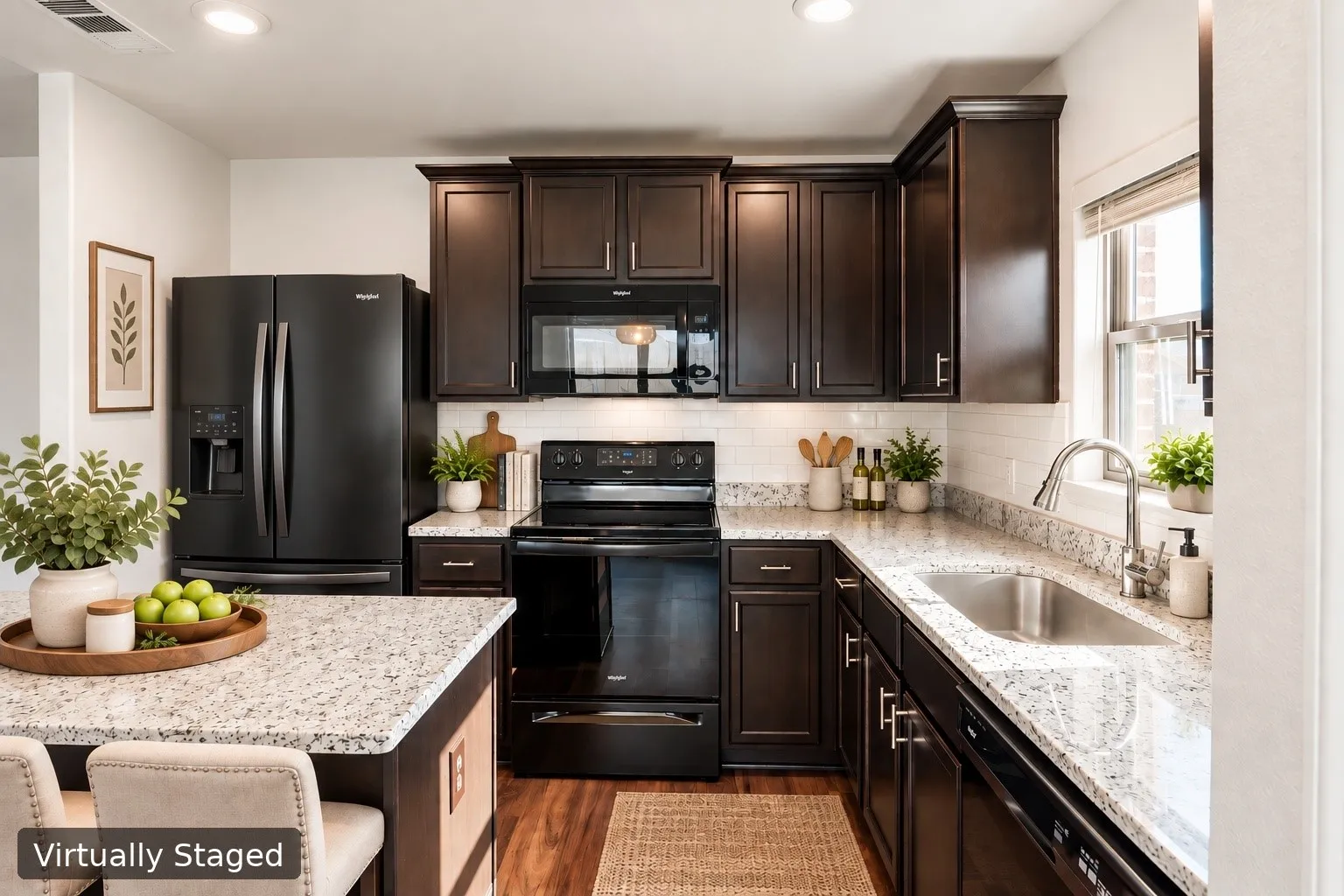 Virtually staged. Kitchen featuring dark wood-finish cabinetry, light-toned countertops, subway tile backsplash, and stainless steel sink