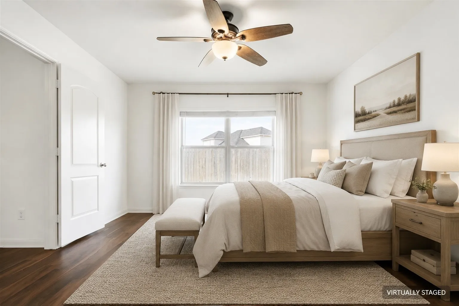 Virtually Staged. Wood-finish LVP  flooring with a ceiling fan light fixture