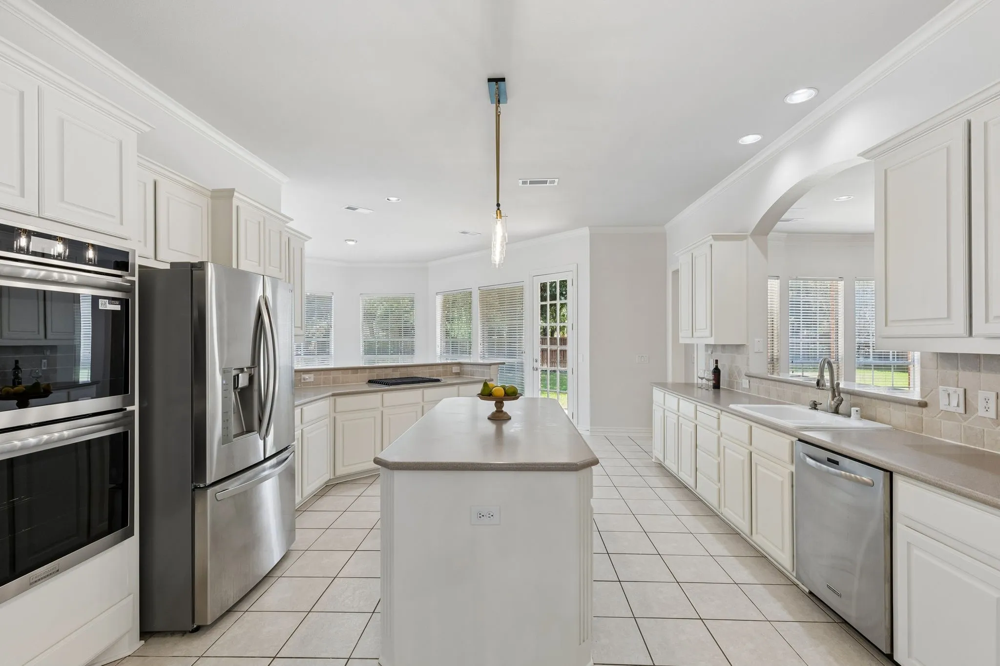Such a great open kitchen - with new stainless appliances - double ovens - and plenty of counter space for lots of helpers.