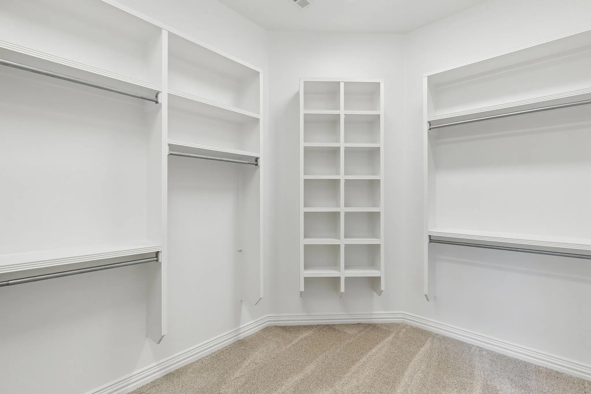 What a great primary closet with plenty of room for all your things!