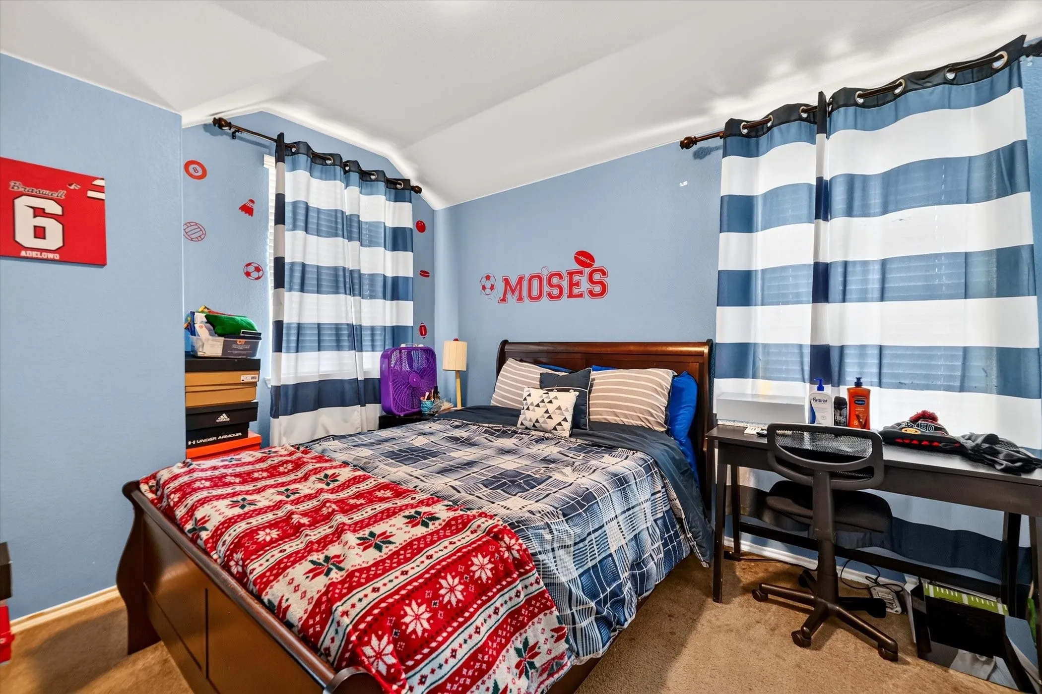 Wall-to-wall carpeting and sloped ceilings