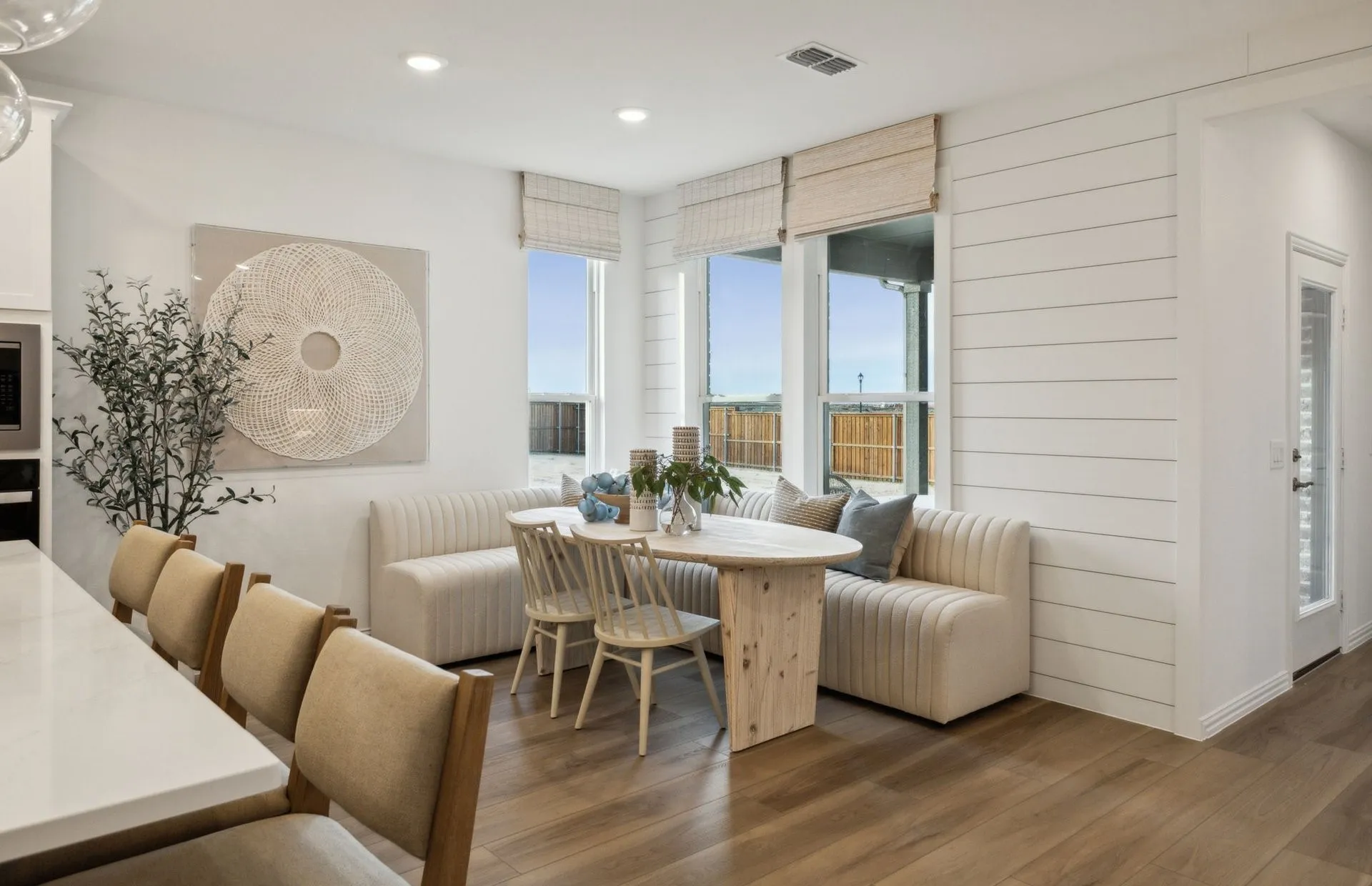 *Model Representation - Dining area off kitchen with large windows