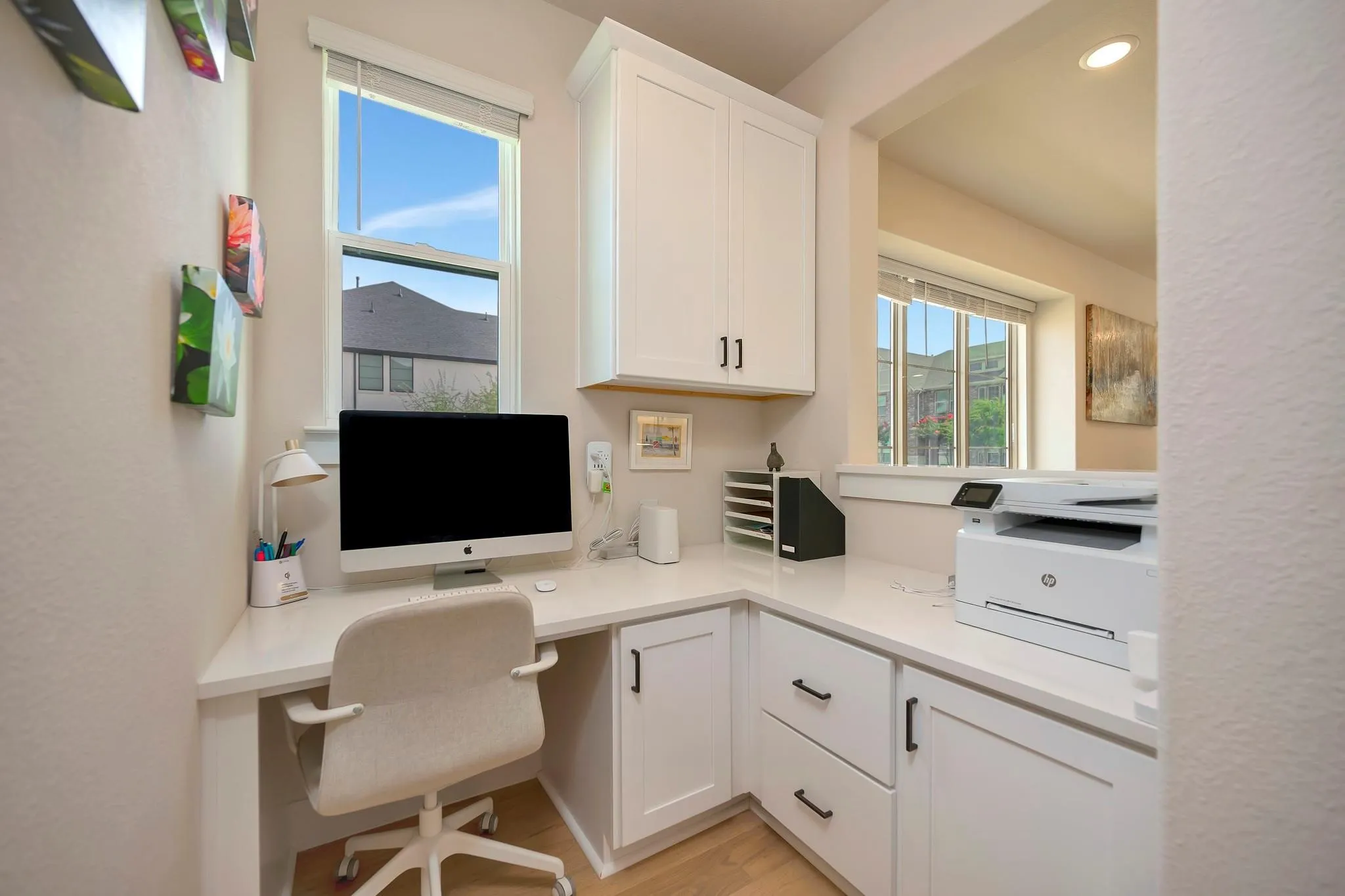 Built-in corner desk with a white countertop