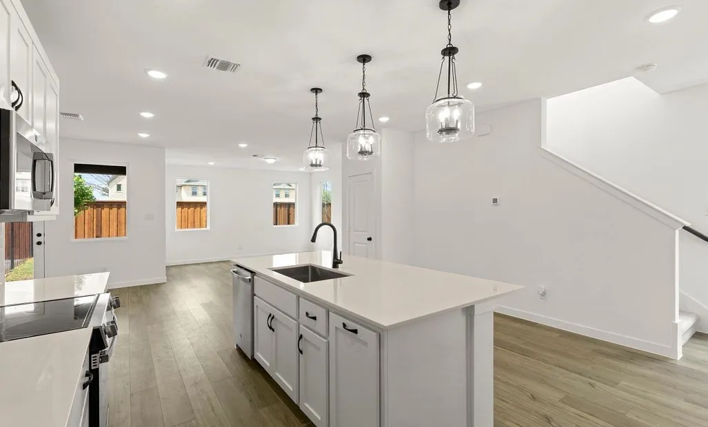 Open Kitchen-Living-Dining Room Representative Photo featuring the Harmony Collection