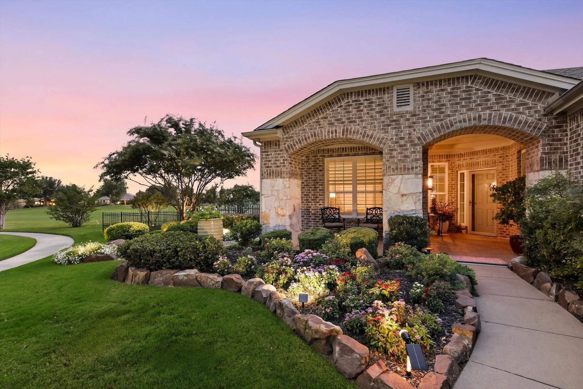 Elegant Landscaping with a view of greenbelt and golf course