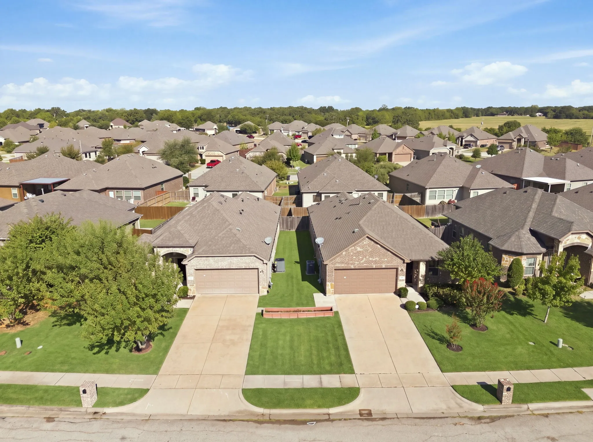 Homes right next door to each other. Both homes are available for sale.