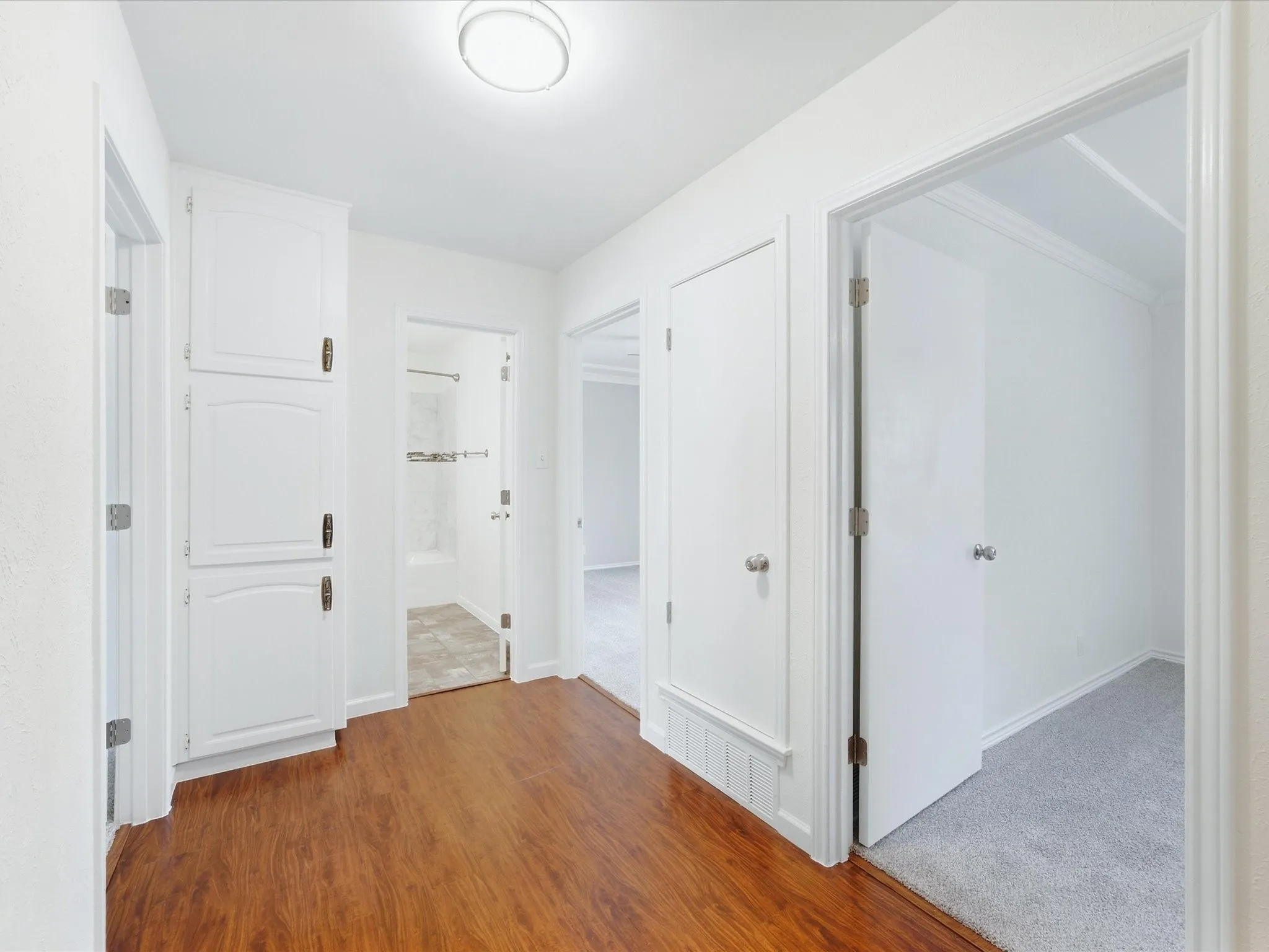 Wood-finish flooring with white trim