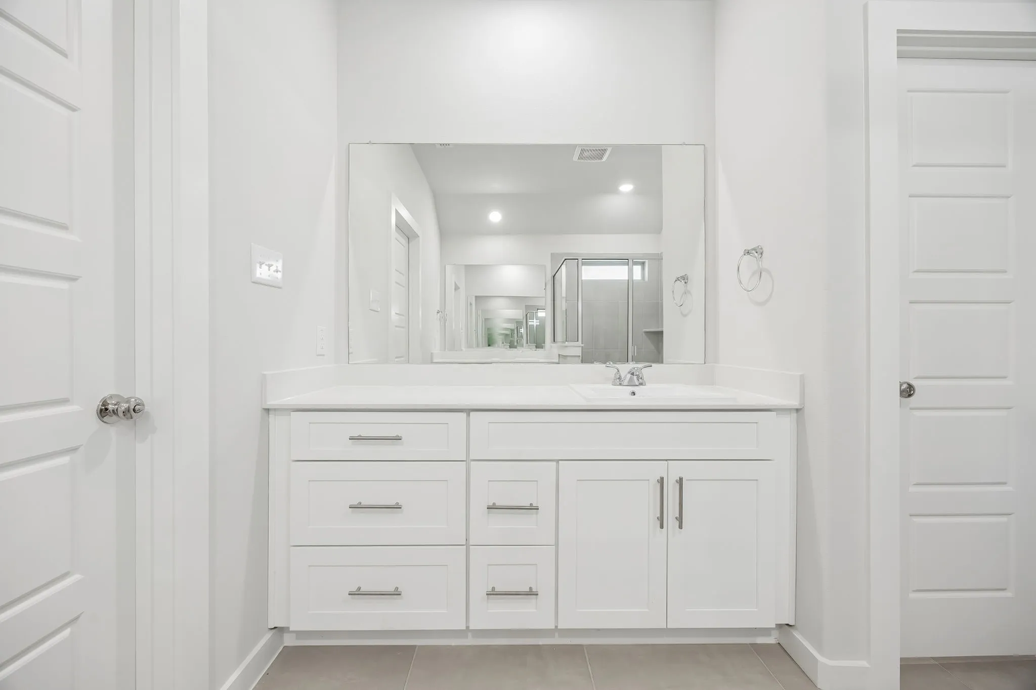 Primary bathroom in the Heisman home plan by Trophy Signature Homes – REPRESENTATIVE PHOTO