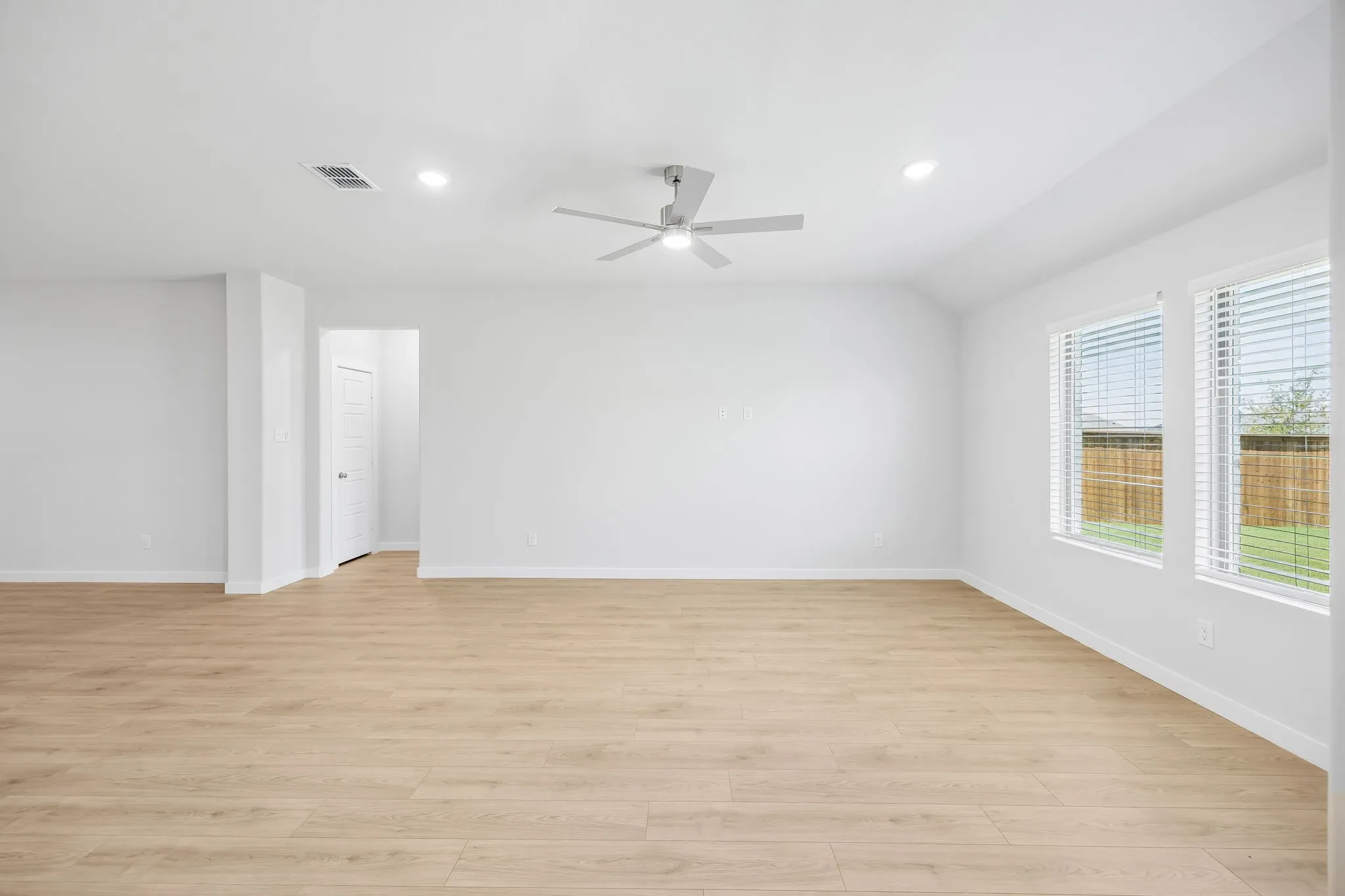 Living room in the Heisman home plan by Trophy Signature Homes – REPRESENTATIVE PHOTO